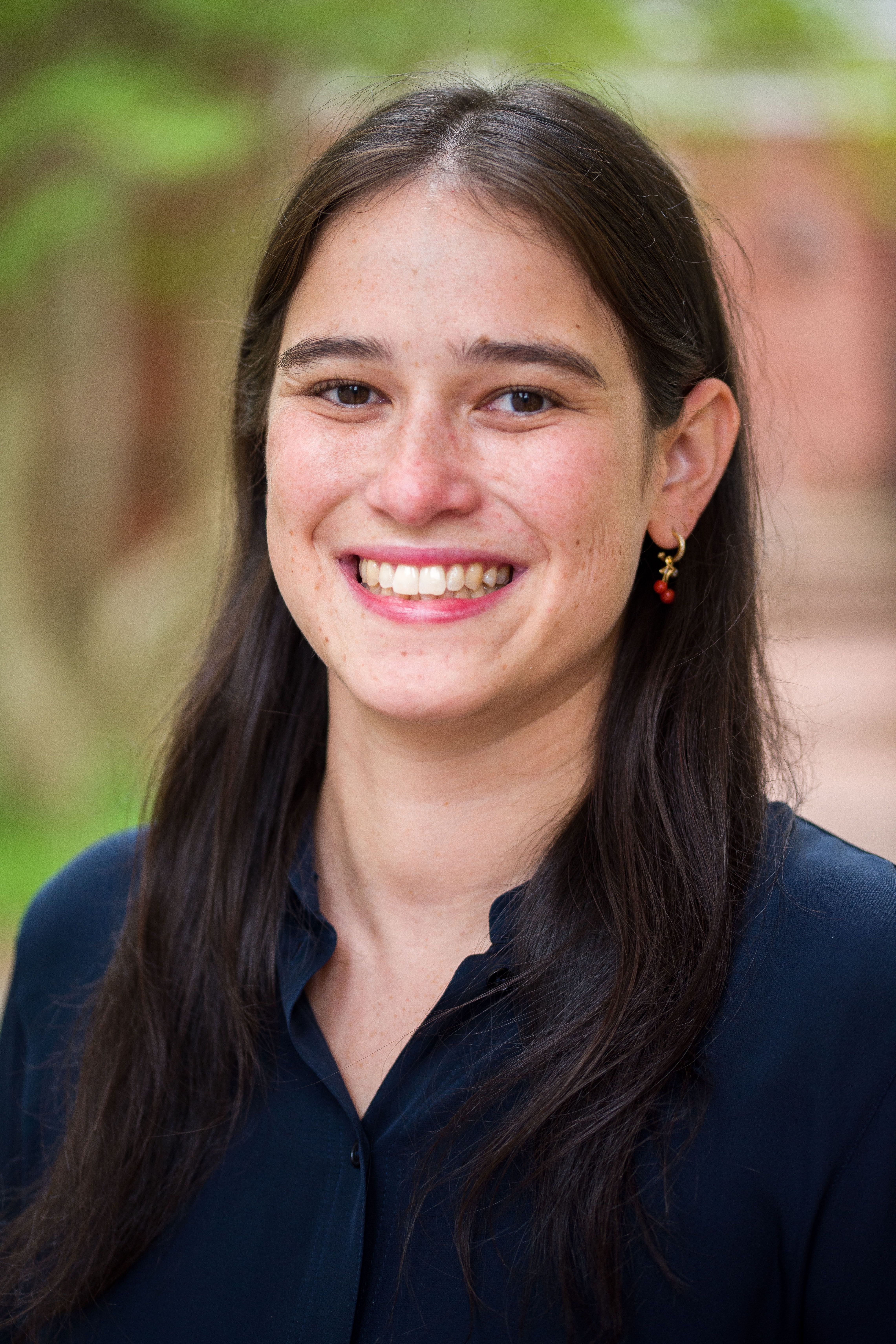 Headshot of Emily Madrigal