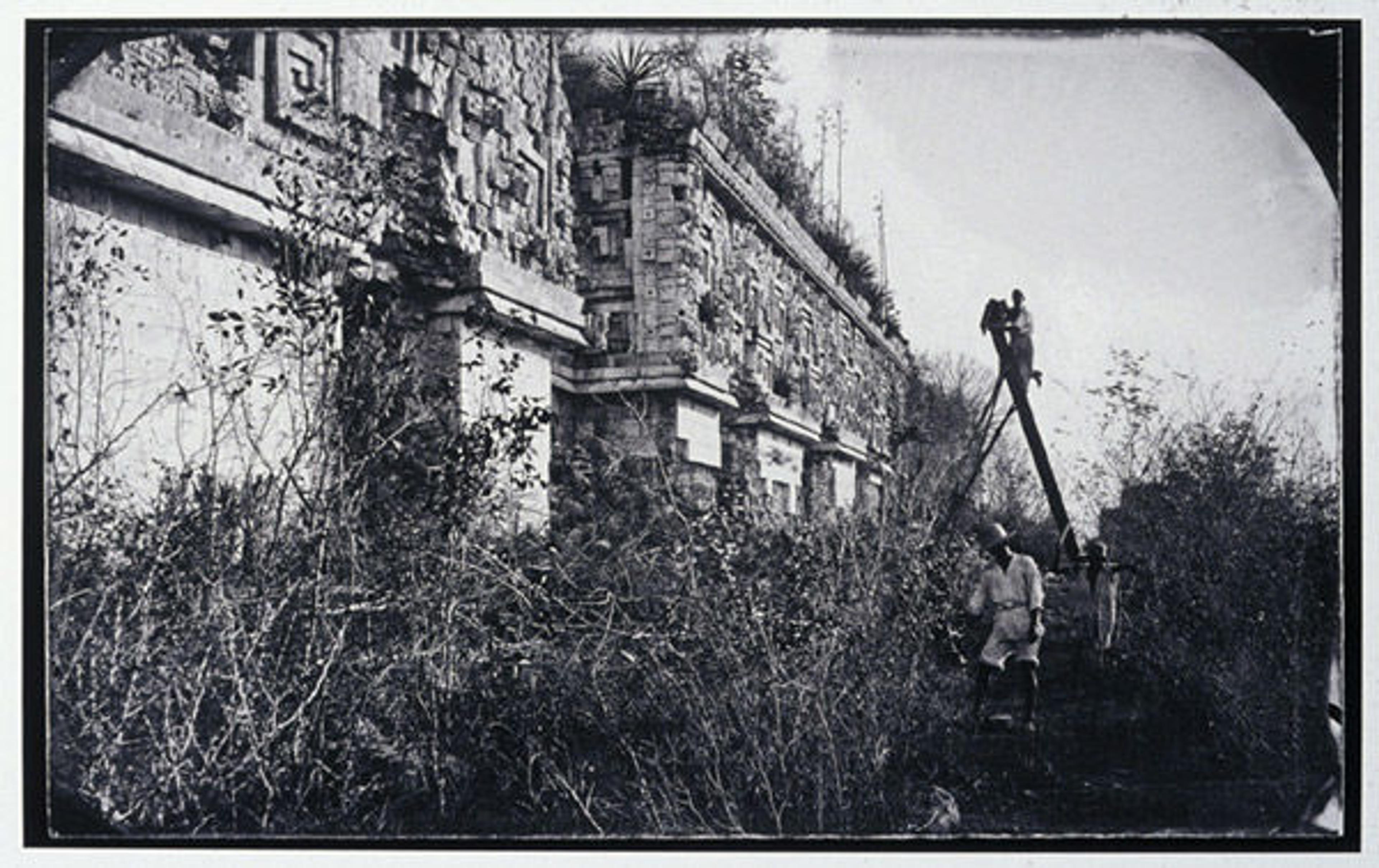 Augustus Le Plongeon photographing the ruins of Uxmal on a ladder. Photograph by Alice Dixon LePlongeon, ca. 1873. Getty Research Institute (2004.M.18-b15.18) 