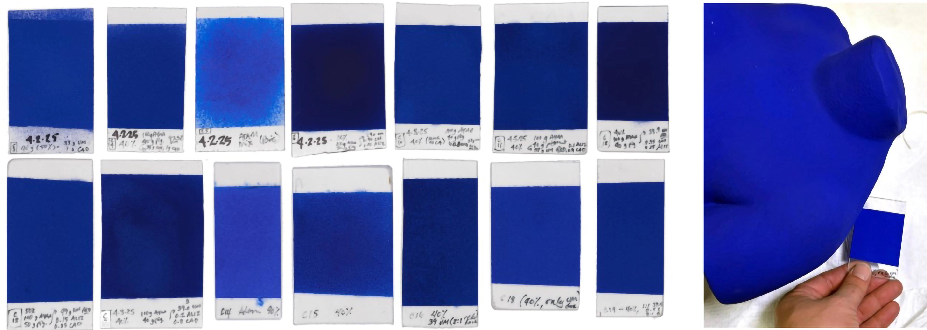 At left, fourteen swatches of different shades of blue paint, and at right, an image showing one swatch next to the statue.