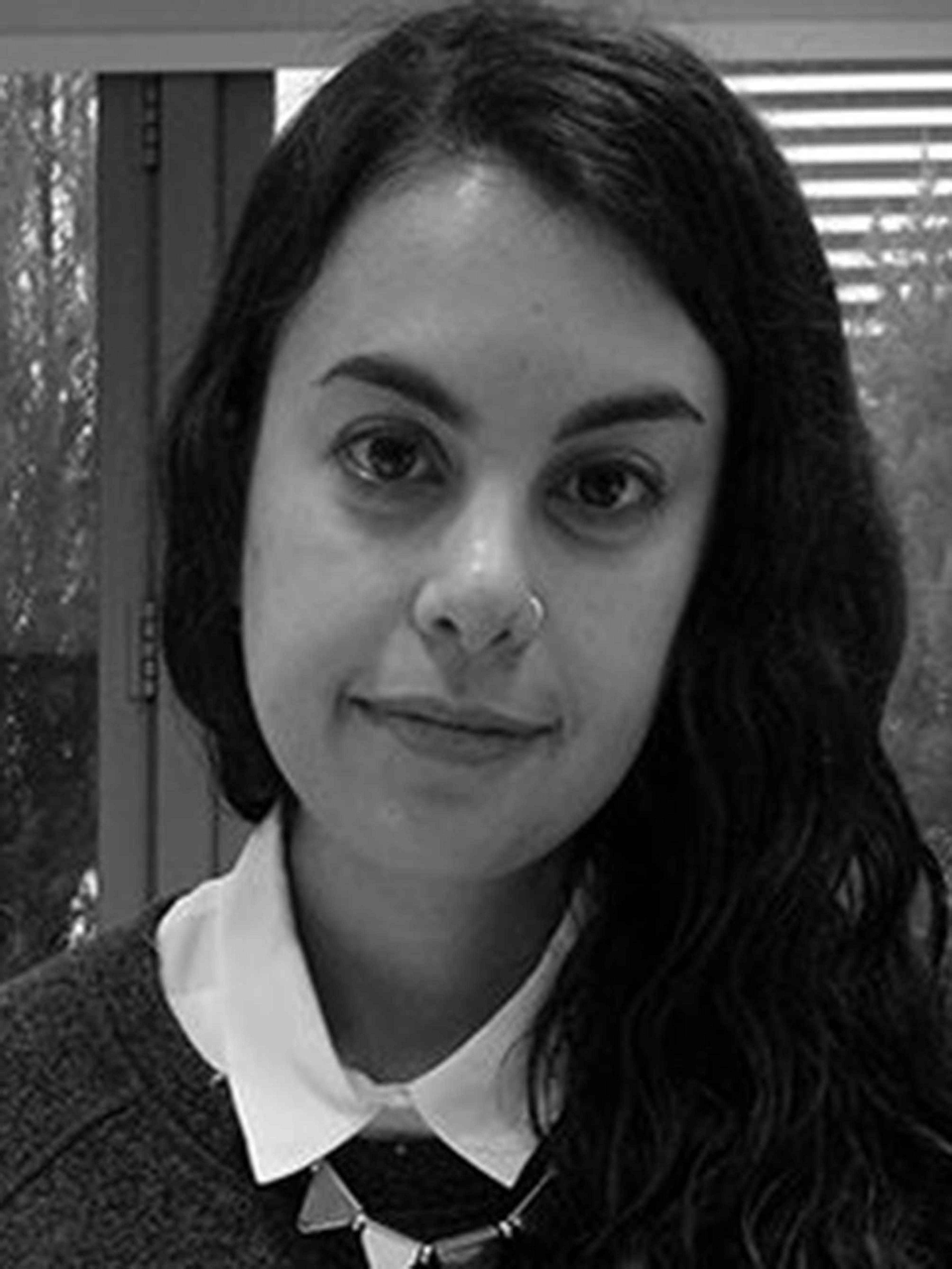 Headshot of Rebecca Capua