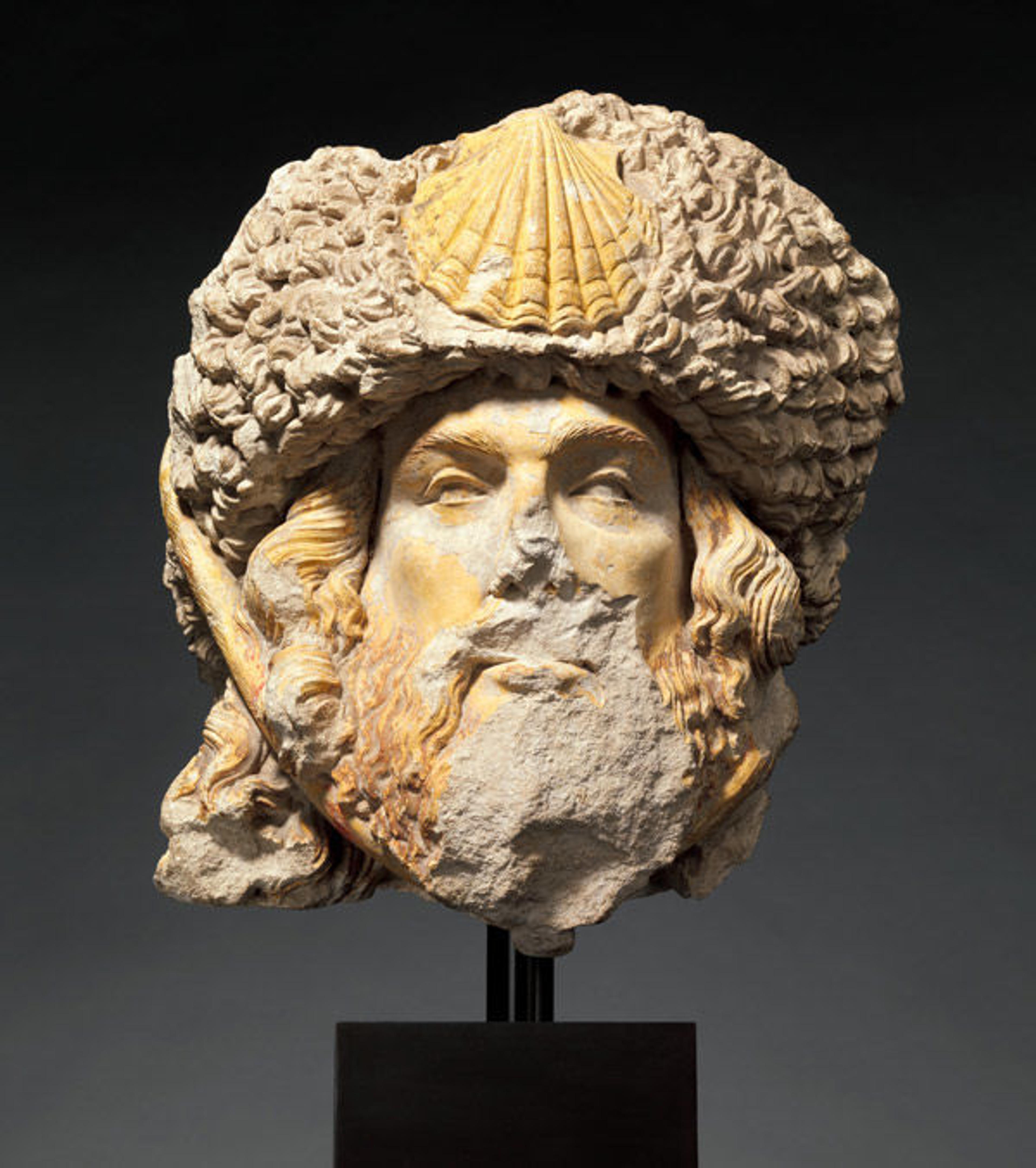 Head of Saint James the Greater with Sheepskin Hat with Scallop Shell, 1450–1500. Made in Burgundy (?), France. French. Limestone with traces of paint; 14 1/8 x 12 1/2 x 9 1/8 in., 44 lb. (35.8 x 31.7 x 23.1 cm, 20 kg). The Metropolitan Museum of Art, New York, Purchase, The Cloisters Collection and Audrey Love Foundation Gift, 2015 (2015.241)