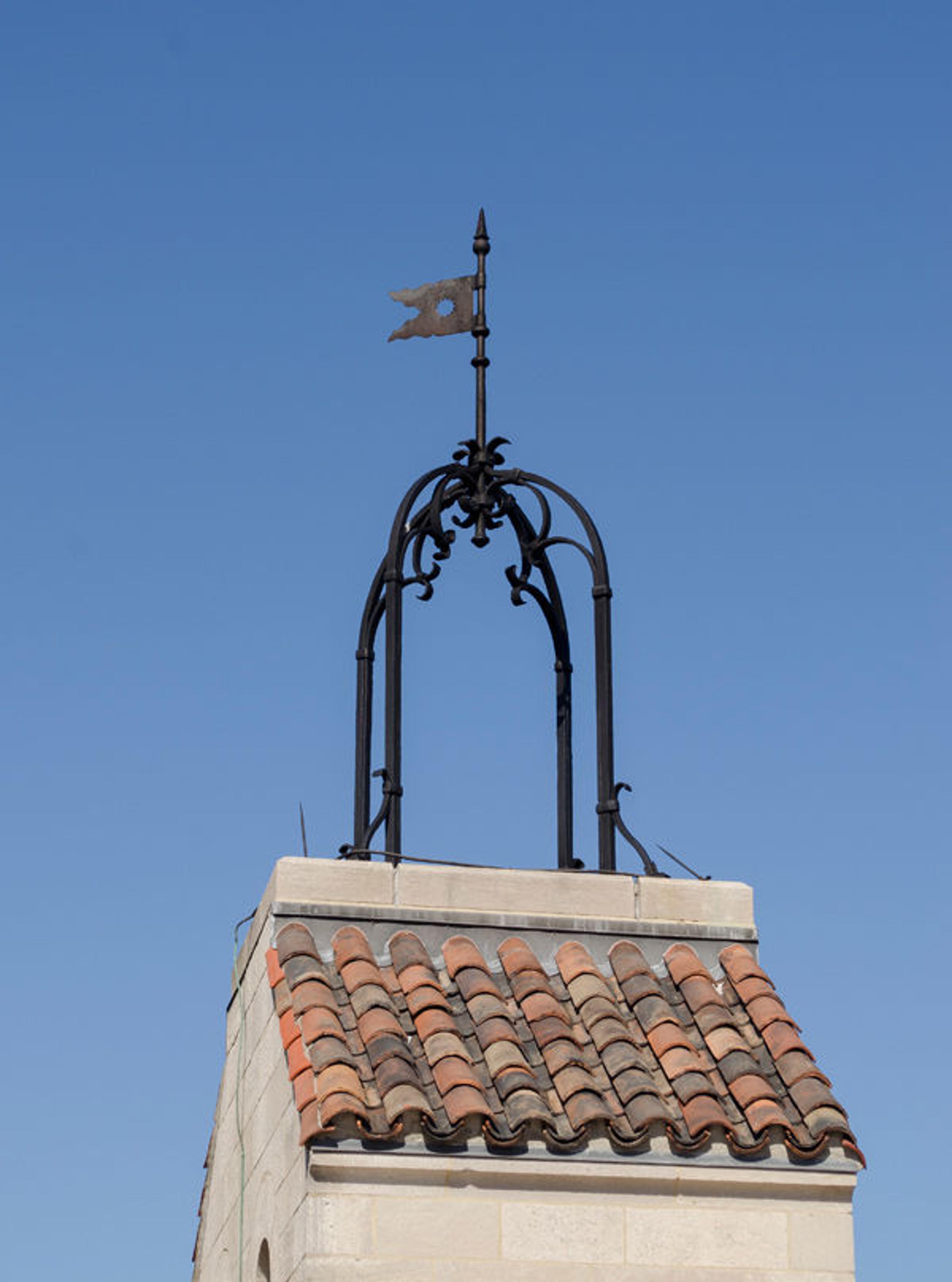 Bell frame with pennant installed on the chimney