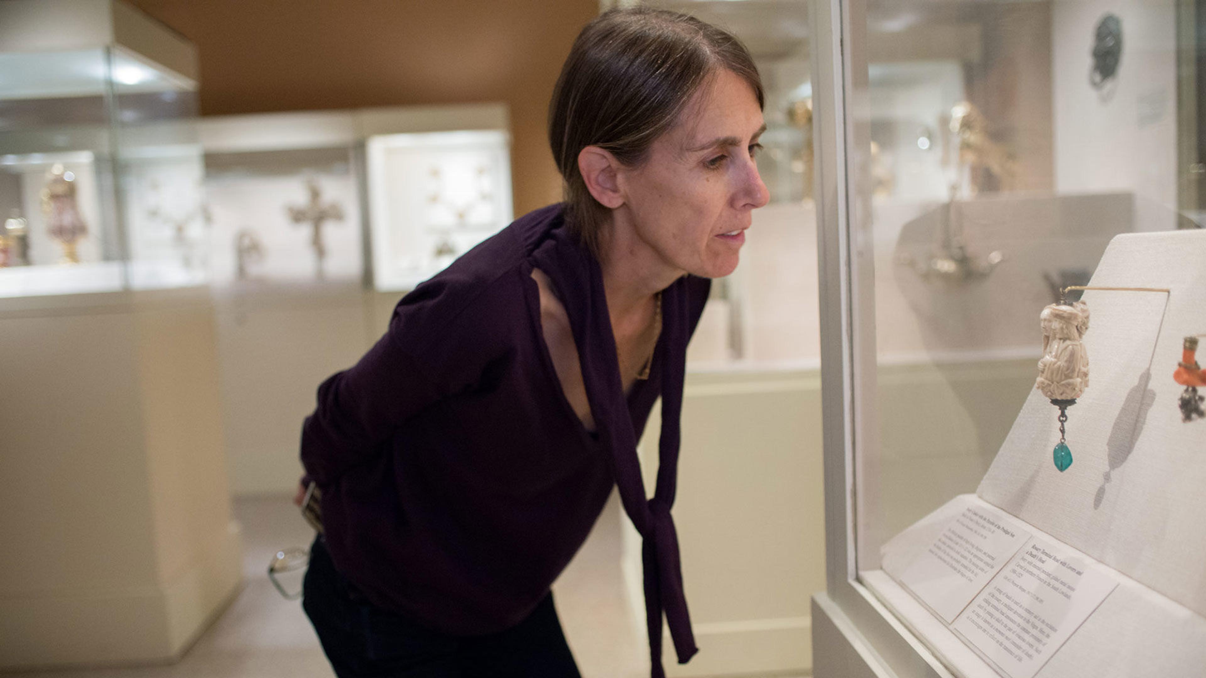 Moyra Davey on a rosary terminal bead with lovers and Death's head