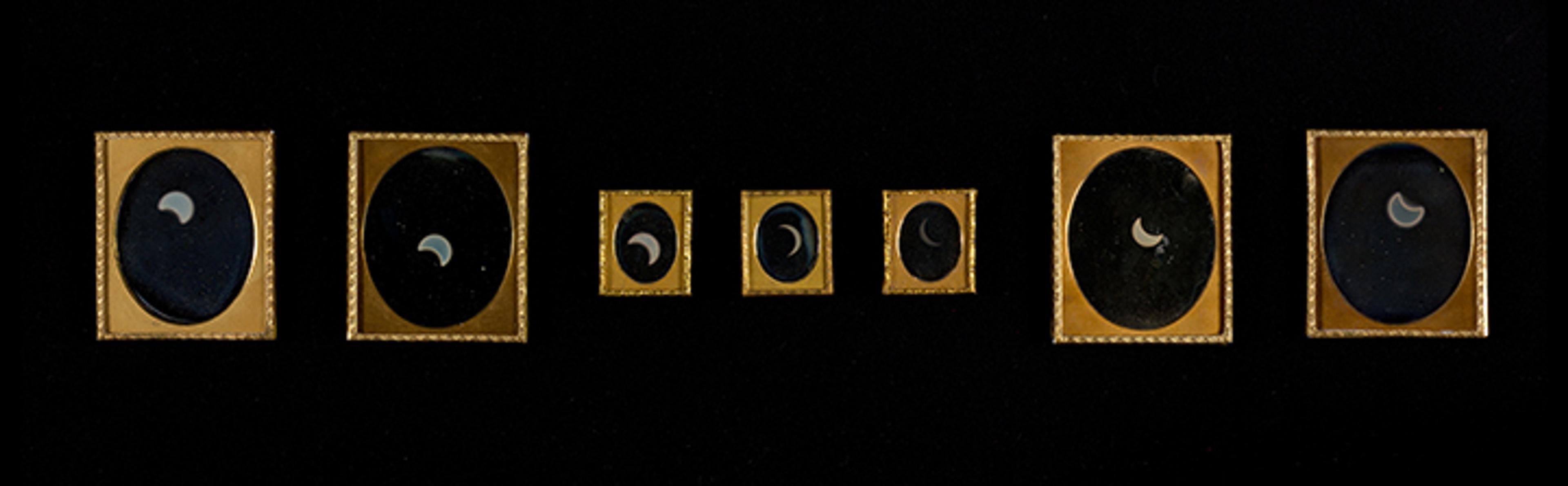 A series of 7 daguerreotype photographs of a total solar eclipse by William and Frederick Langenheim