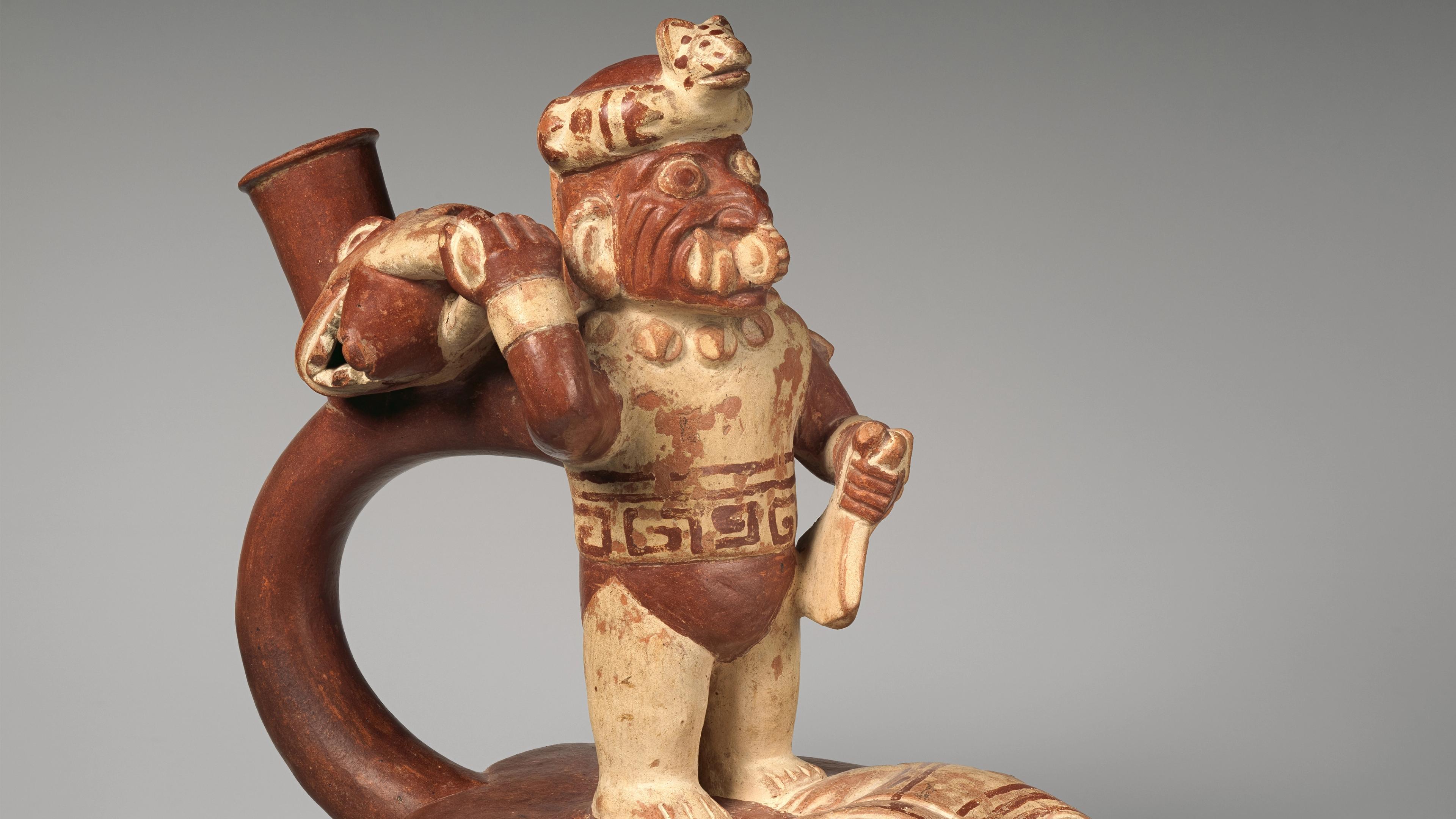 Stirrup-spout bottle with decapitation scene
