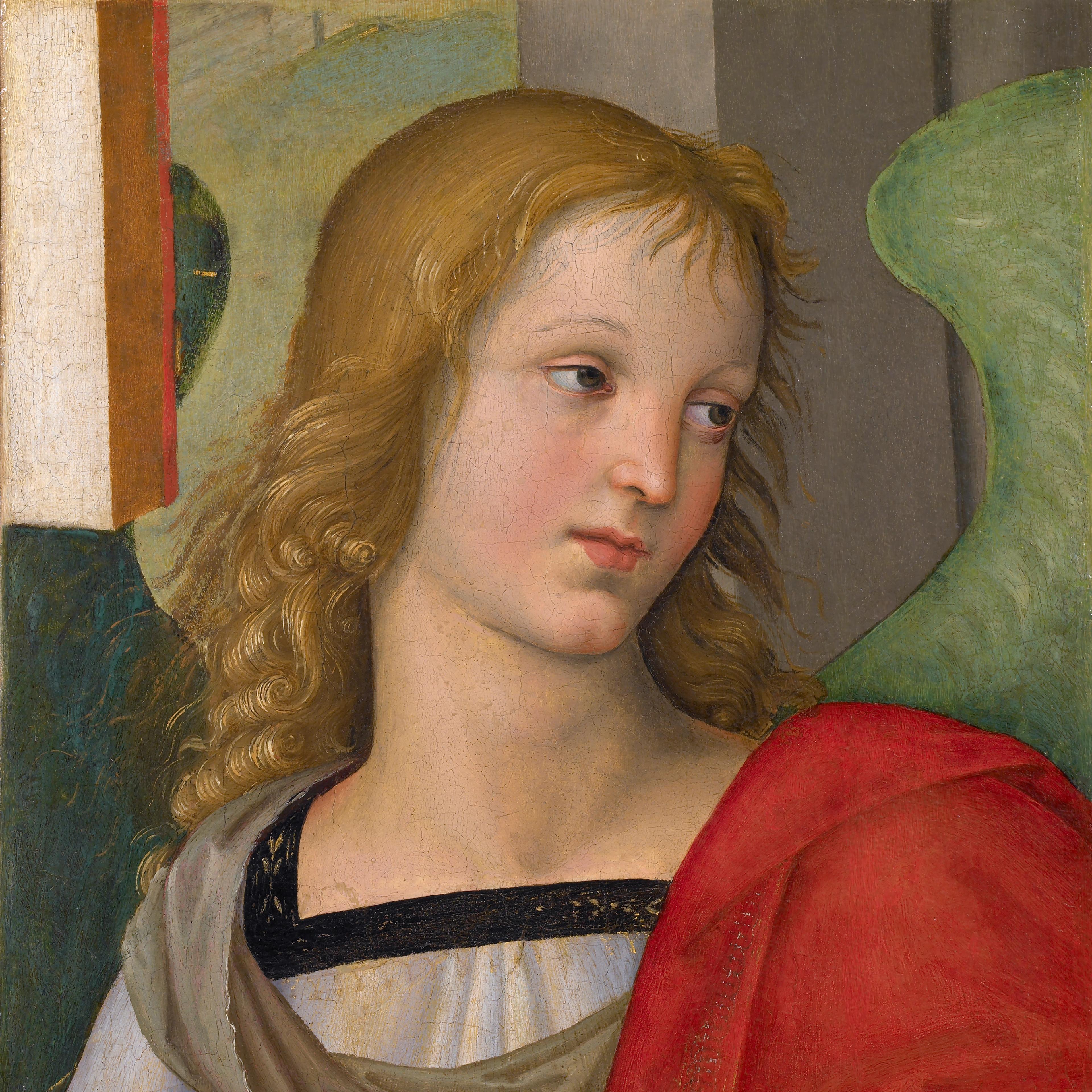 A blonde, angel looking downwards with a green wing coming out of its back. The angel is draped in a white and red robe.
