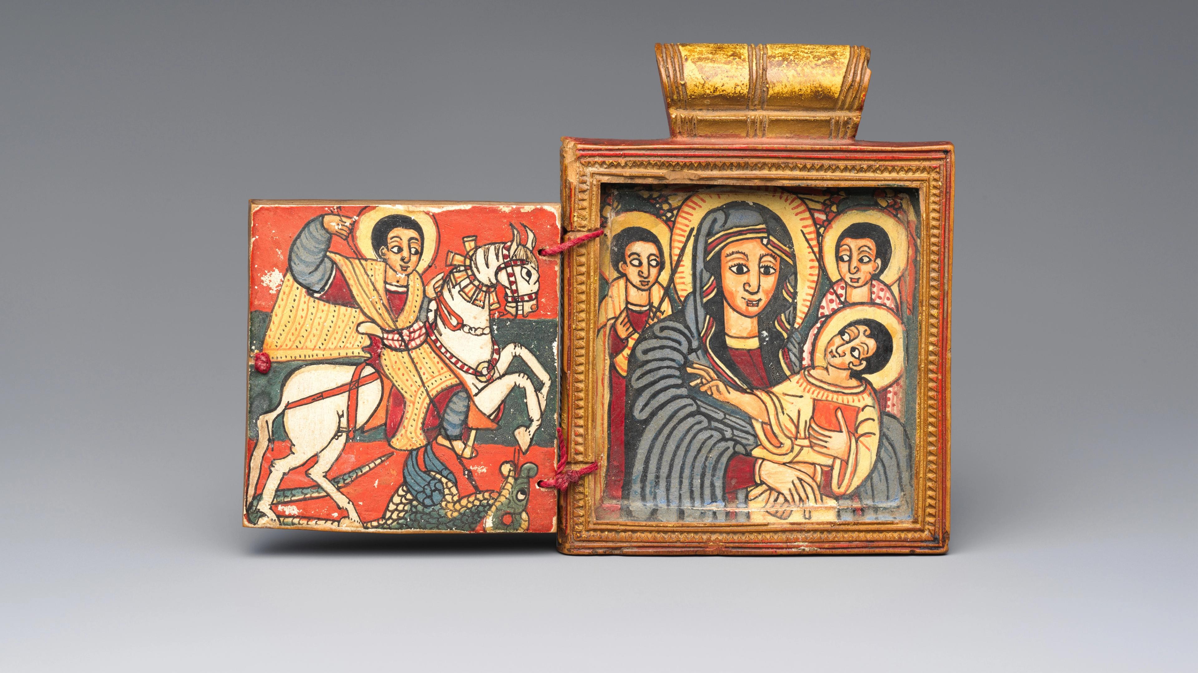 Double Diptych Icon Pendant showing the Virgin Mary holding Christ, flanked by archangels on the right, and Saint George on horseback slaying the dragon on the left