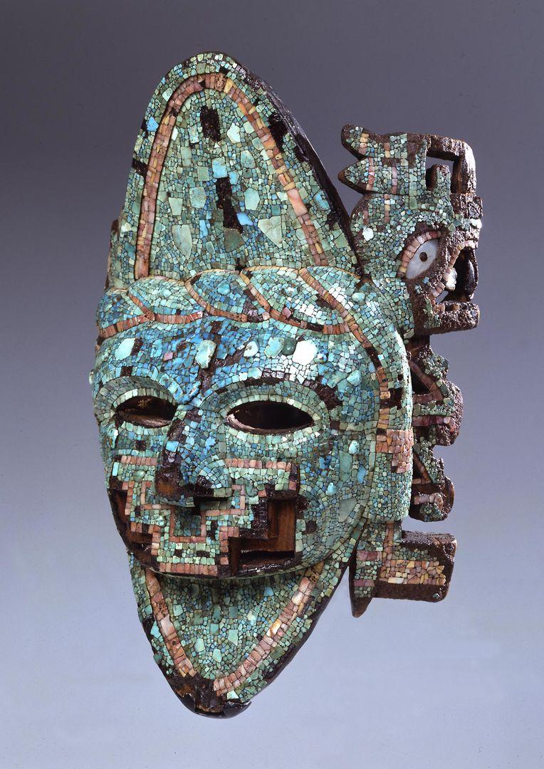 A mask from the ancient Americas made of turquoise, wood, mother-of-pearl, shell