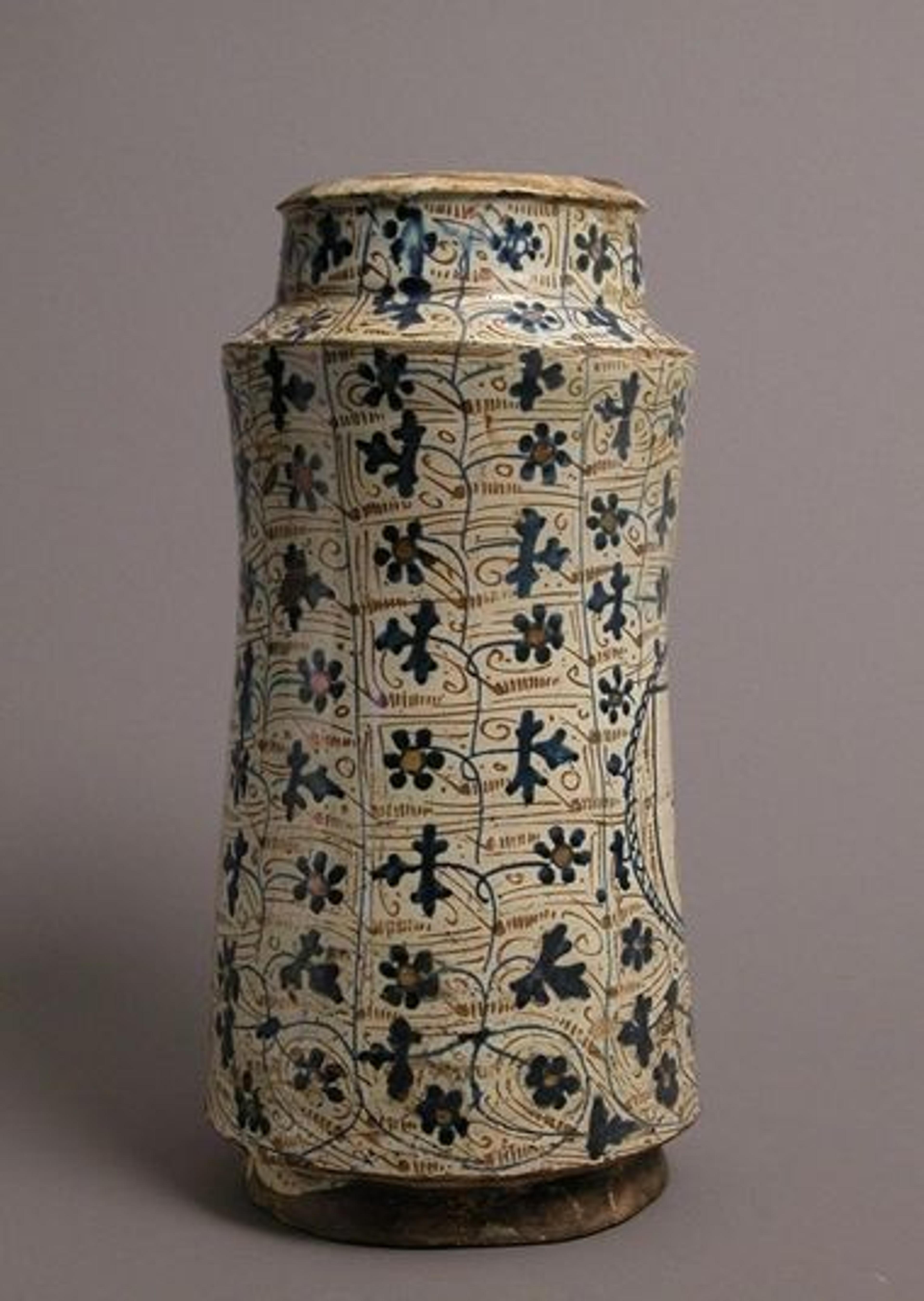 A lusterware albarello or pharmacy jar patterned with stylized bryony vines