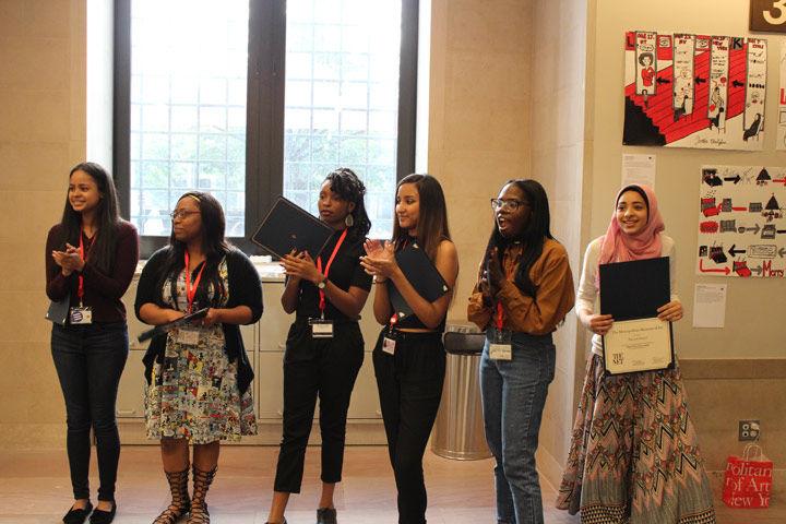 Excited Interns stand in front of the audience to be honored for their contributions to Exploring What Matters: An Exhibition by The Met High School Interns