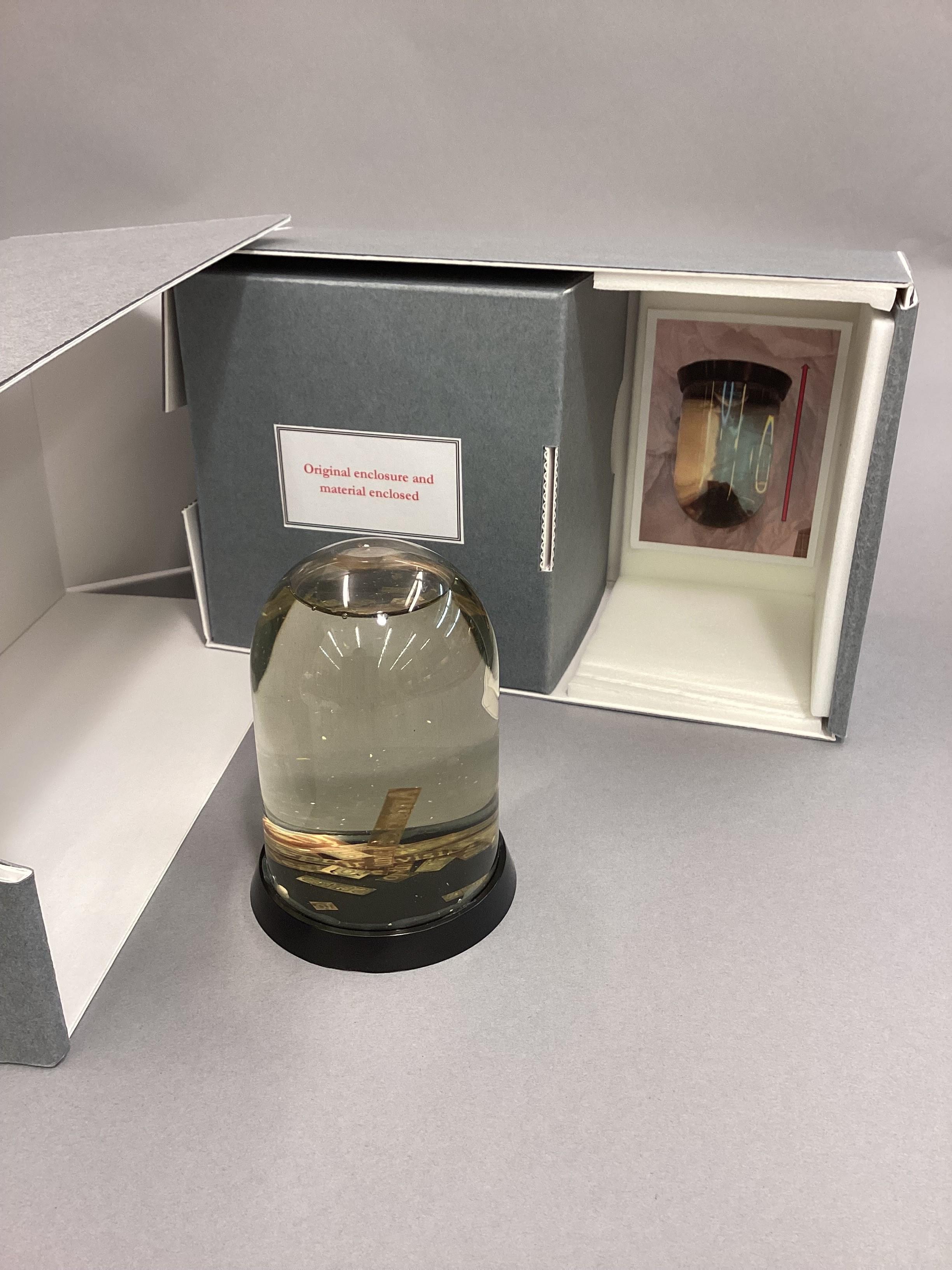 Snow globe-like object in an library box