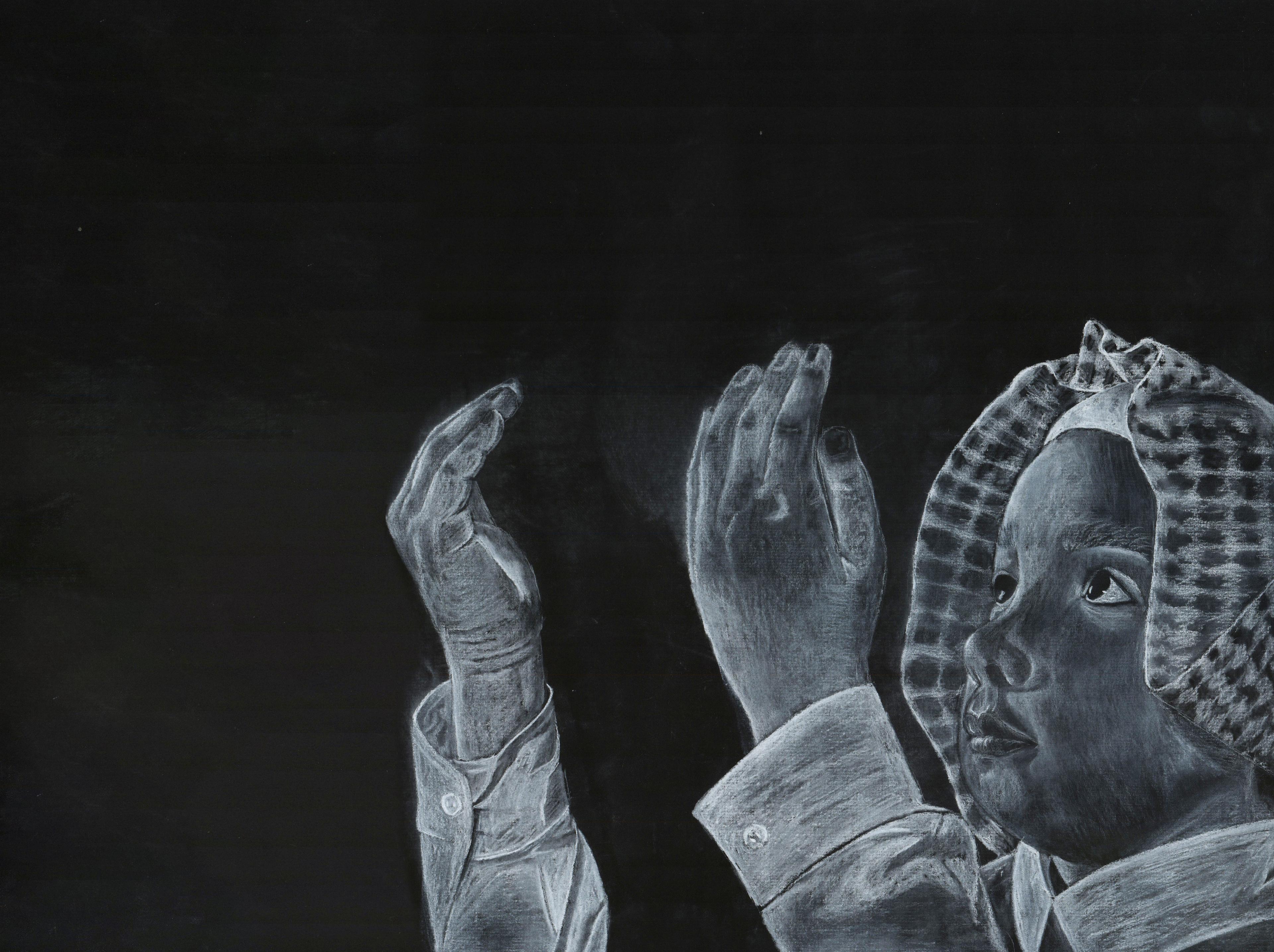 Charcoal reversed white-on-black drawing of a child's head and neck at bottom right, facing left, with hands raised in front, palms facing inward. The child looks upward and wears a keffiyeh draped over their heas and a long-sleeved shirt buttoned down at the cuffs and collar. The prominent background is almost fully black.
