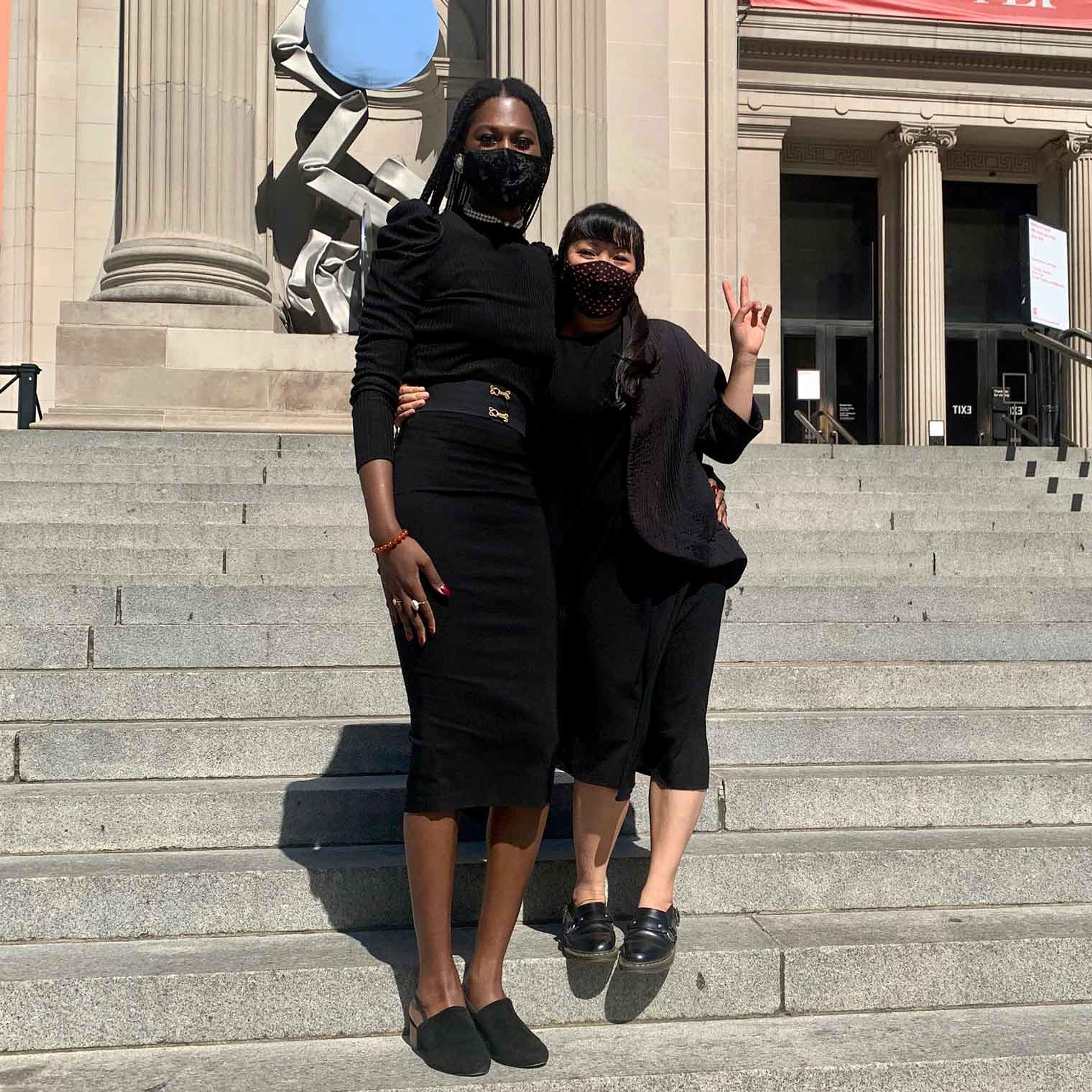 Kai Marcel and Julie Le standing on the Met steps