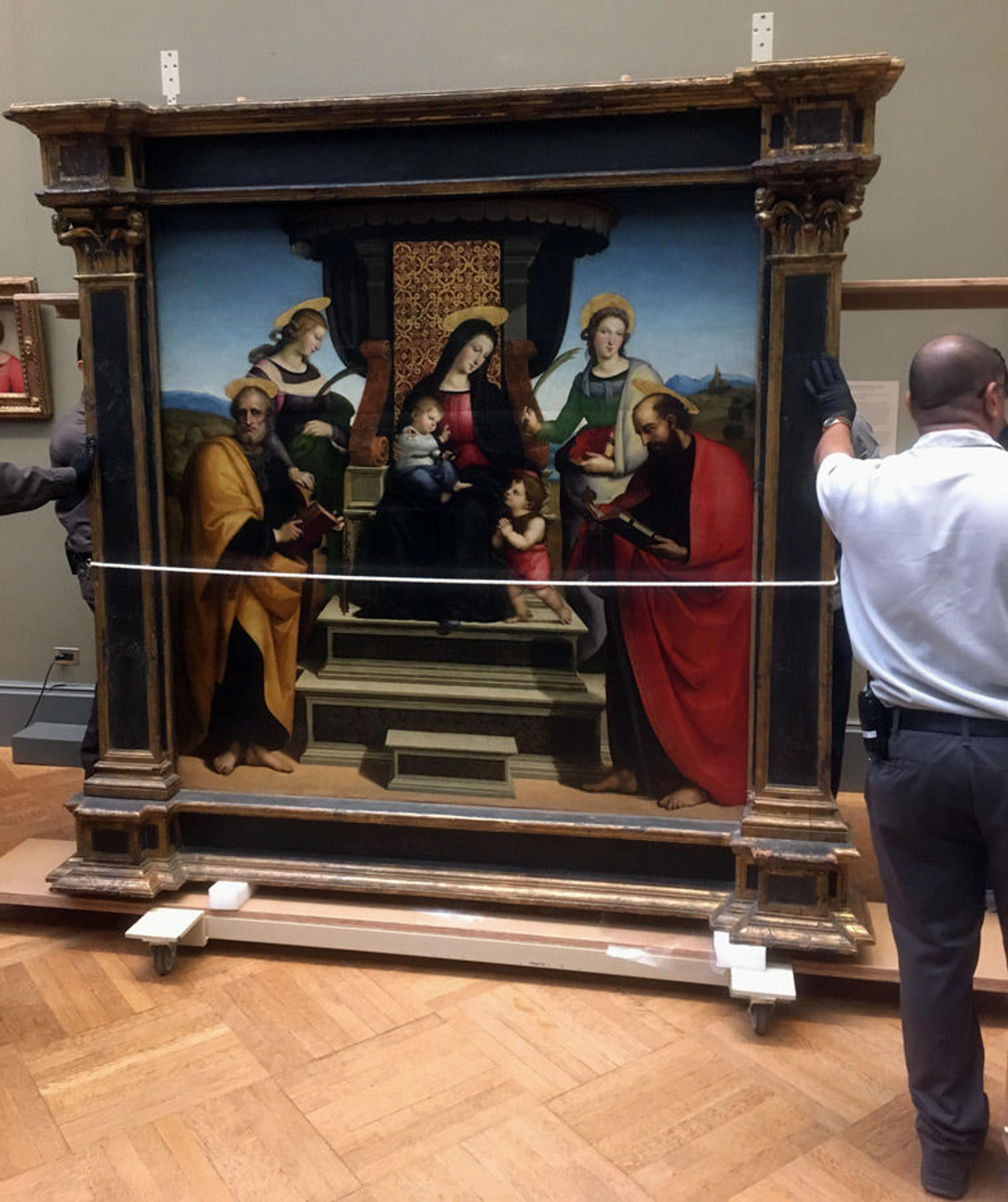 The altarpiece by Raphael is ready to transport to a new gallery location