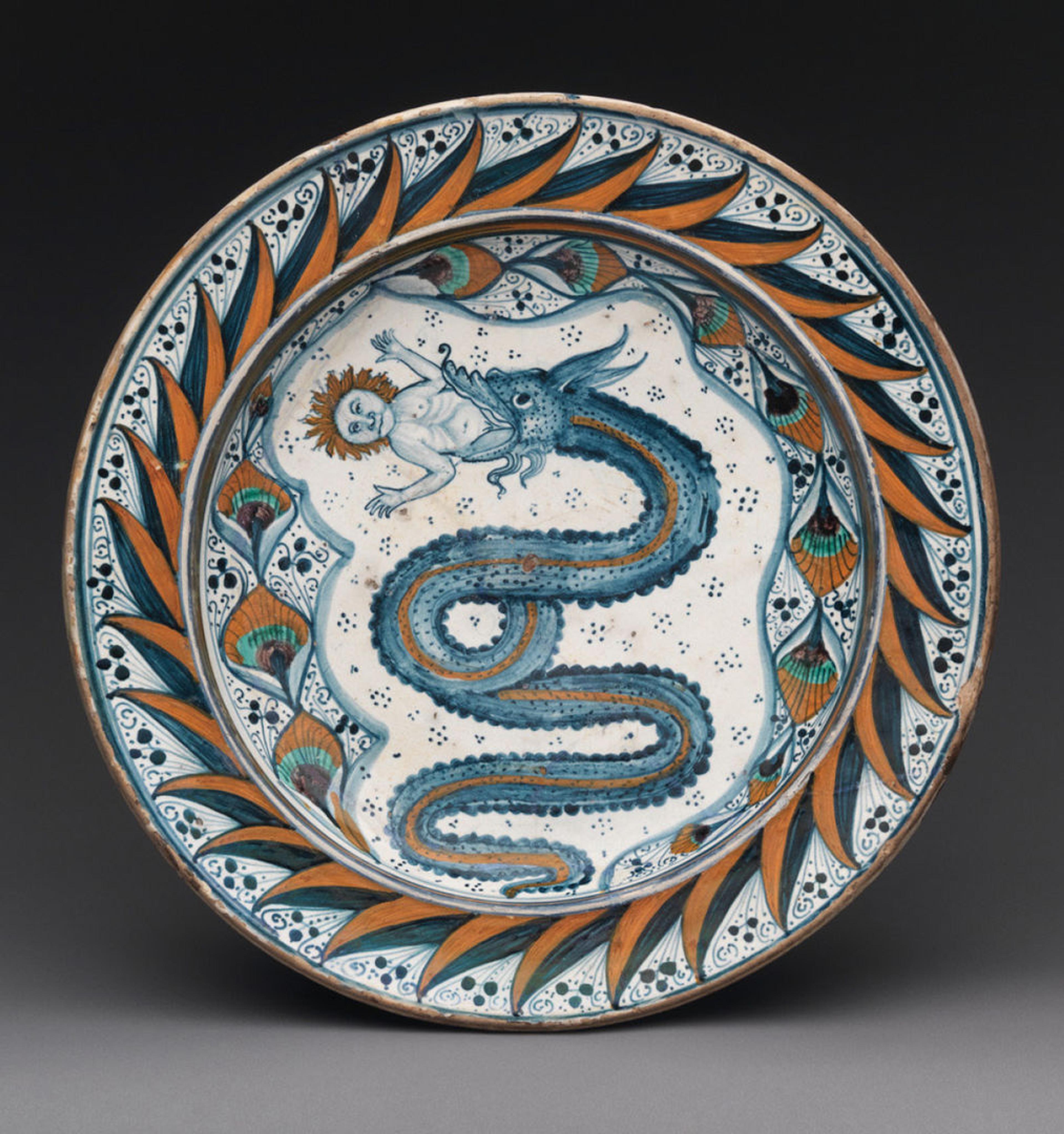 Maiolica (tin-glazed earthenware) featuring the arms of Visconti, an image of a dragon eating a nude man