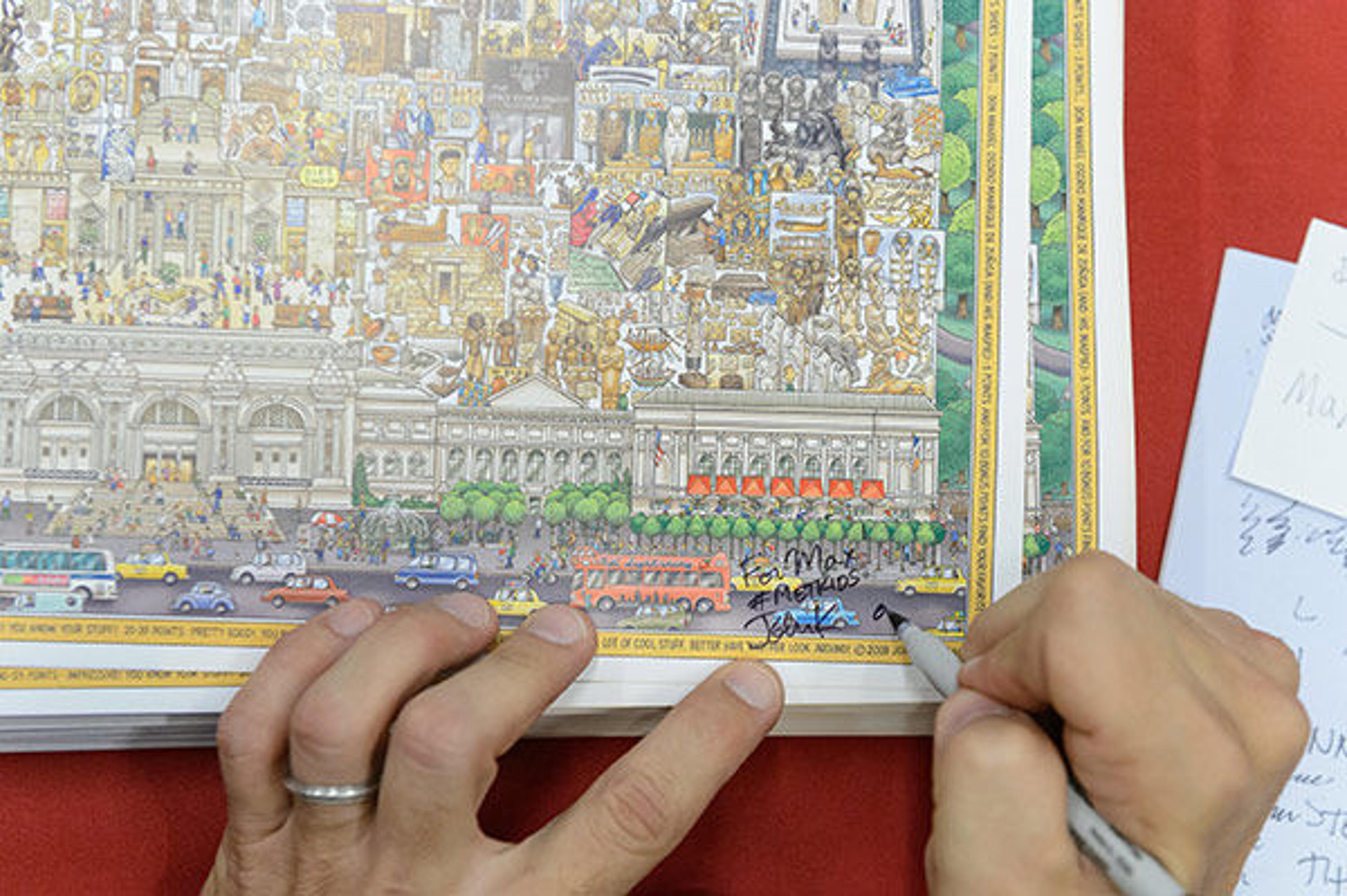 John Kerschbaum signs the Met's Family Map