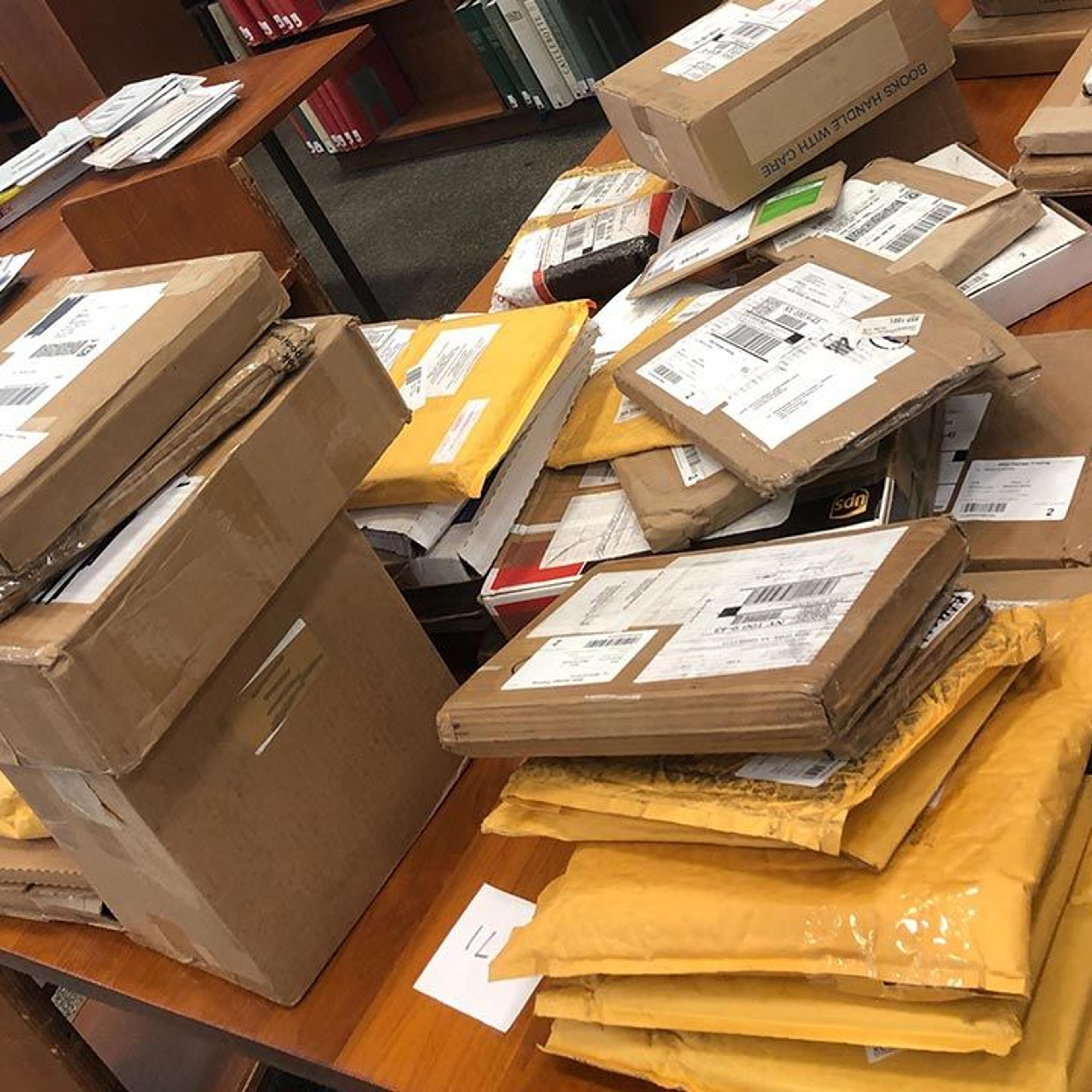 Table covered in unopened boxes