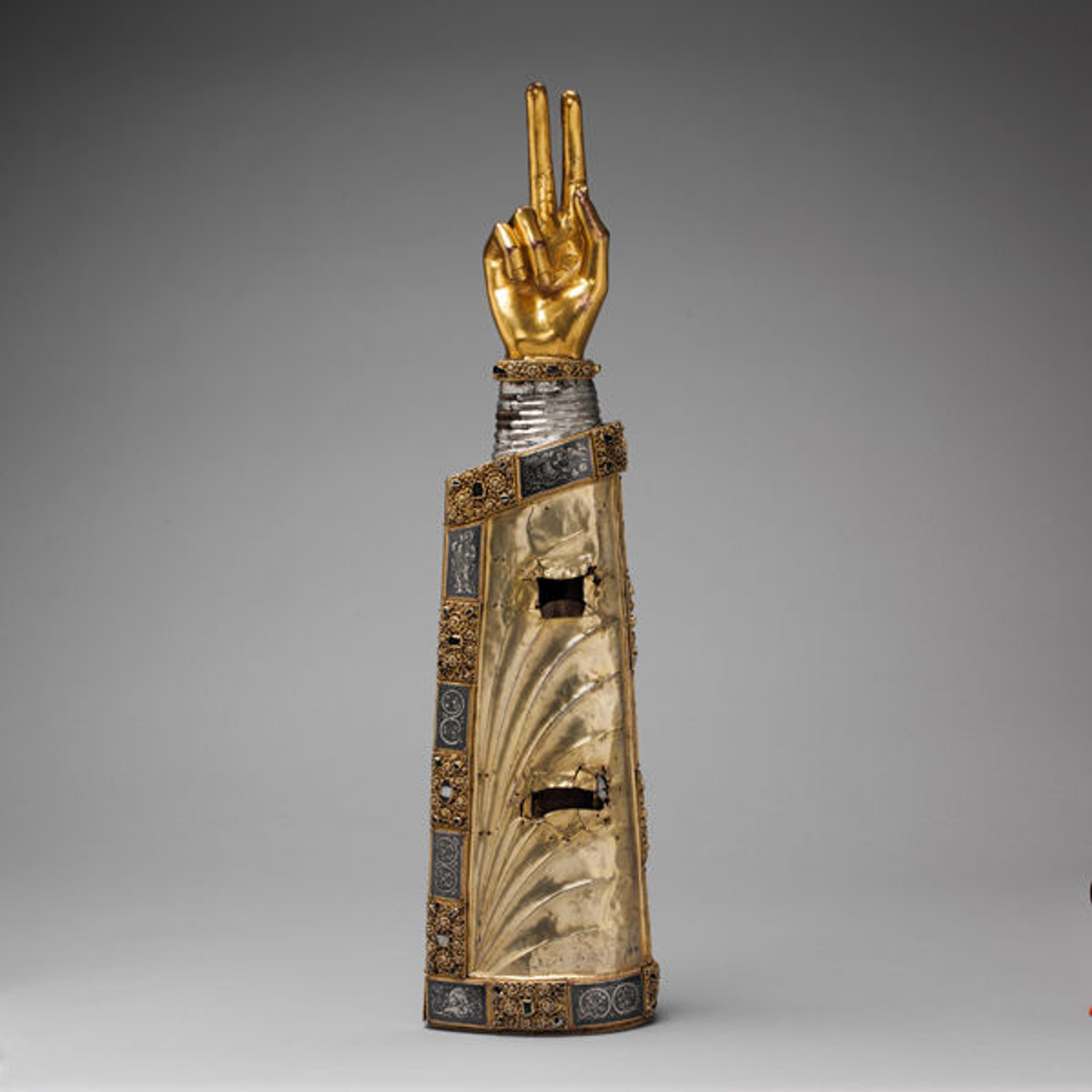Arm Reliquary, ca.1230. Made in Meuse Valley, South Netherlands. Silver and gilded silver over wood core, niello, and gems; 25 1/2 x 6 1/2 x 4 in. (64.8 x 16.5 x 10.2 cm). The Metropolitain Museum of Art, New York, The Cloisters Collection, 1947 (47.101.33)