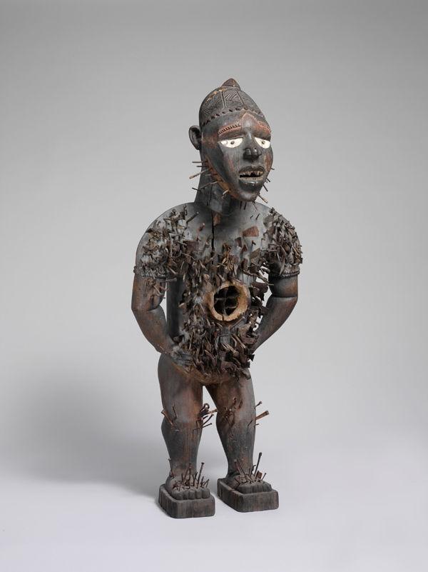 Power Figure (Nkisi N'Kondi: Mangaaka), 19th century. Republic of the Congo or Cabinda, Angola, Chiloango River region. Kongo peoples; Yombe group. Wood, paint, metal, resin, ceramic; H. 46 1/2 in. (118 cm), W. 19 1/2 in. (49.5 cm), D. 15 1/2 in. (39.4 cm). The Metropolitan Museum of Art, New York, Purchase, Lila Acheson Wallace, Drs. Daniel and Marian Malcolm, Laura G. and James J. Ross, Jeffrey B. Soref, The Robert T. Wall Family, Dr. and Mrs. Sidney G. Clyman, and Steven Kossak Gifts, 2008 (2008.30)