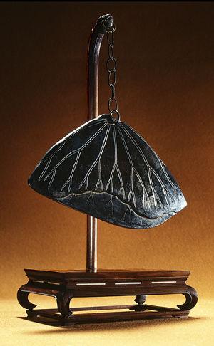 Left: Goqing, 19th century. Amoy Province, China. Wood, metal, stone. The Metropolitan Museum of Art, New York, The Crosby Brown Collection of Musical Instruments, 1889 (89.4.64)