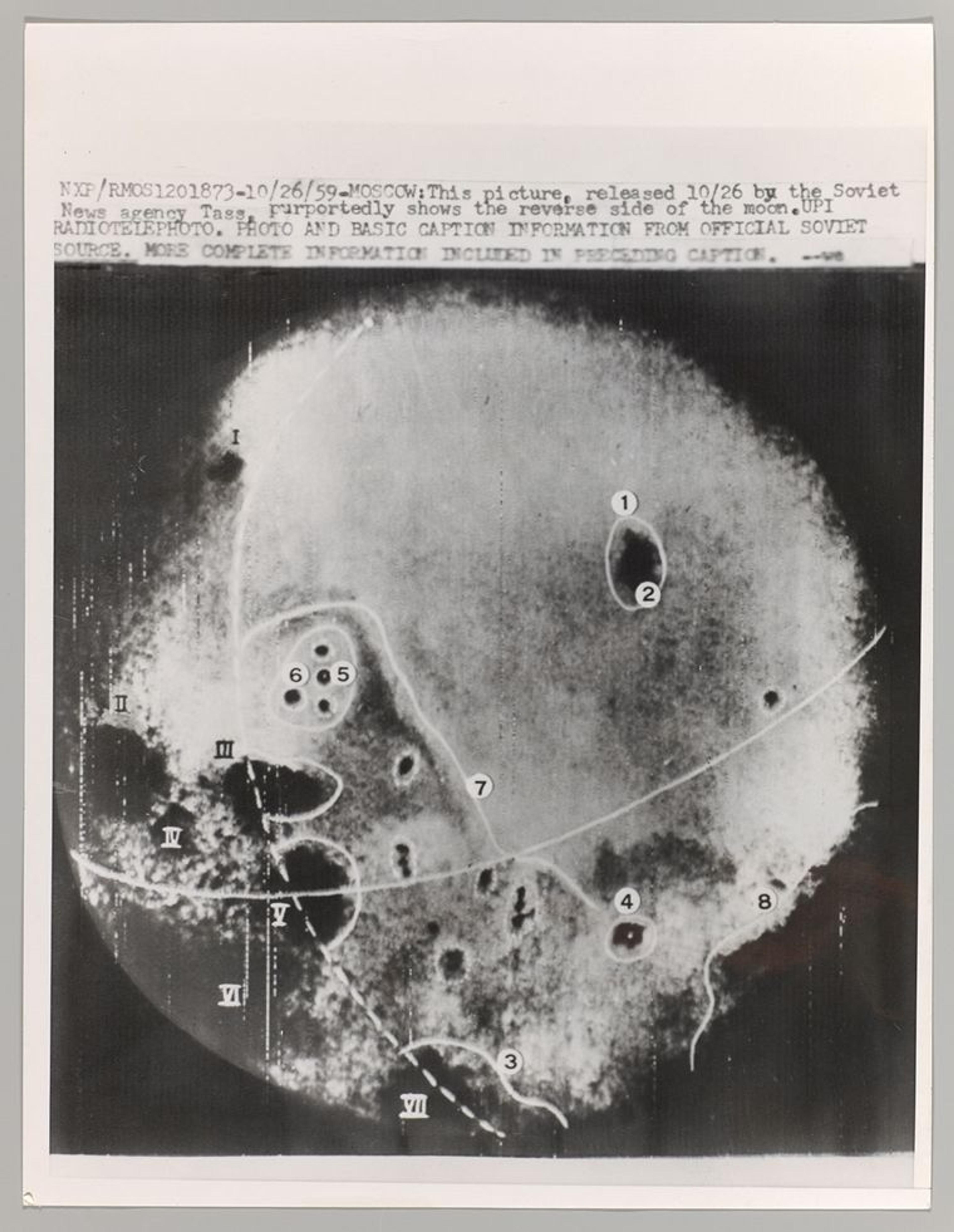 black and white photo of the far side of the moon, 1959, with notations 