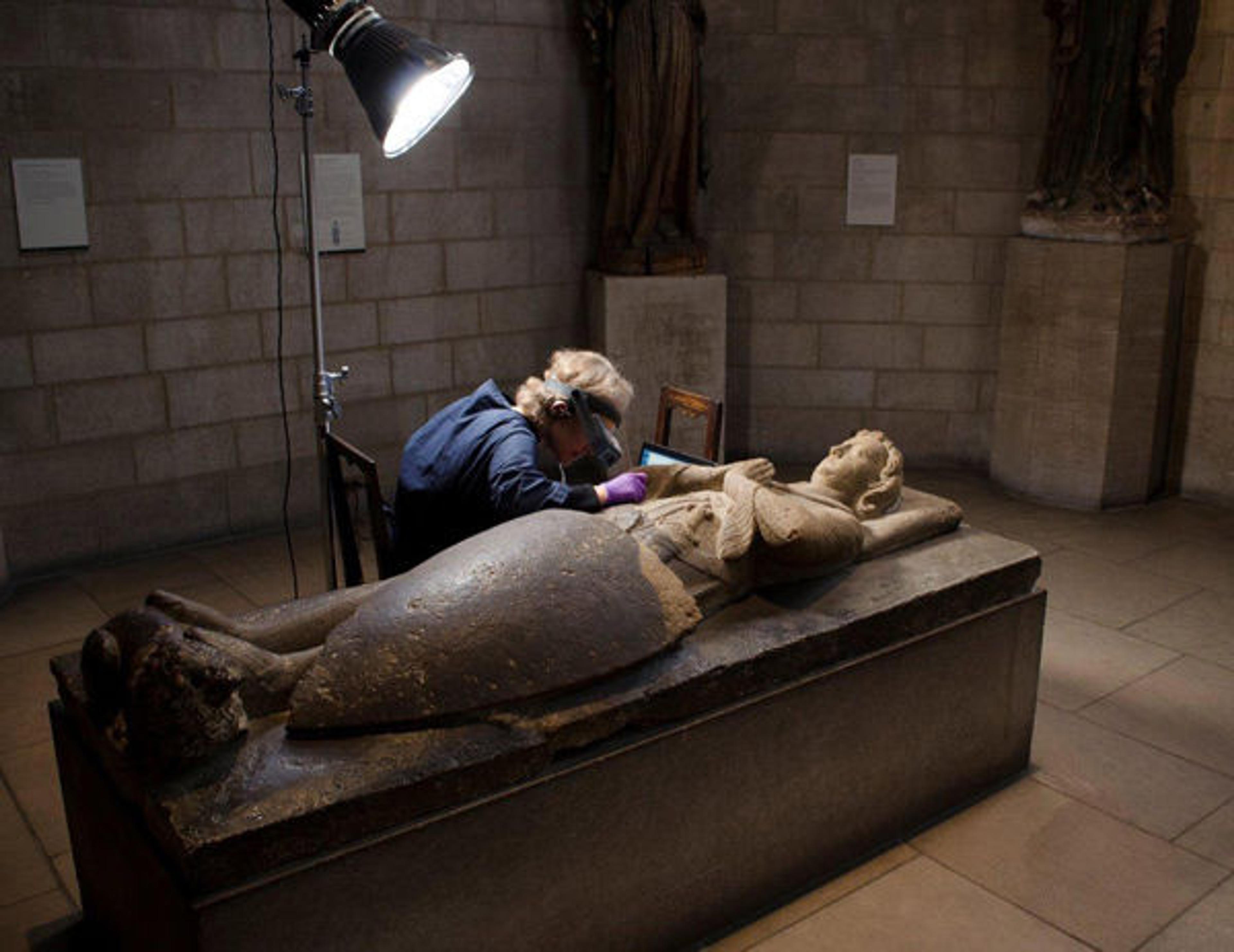 Conservator Lucretia Kargère at work in the galleries