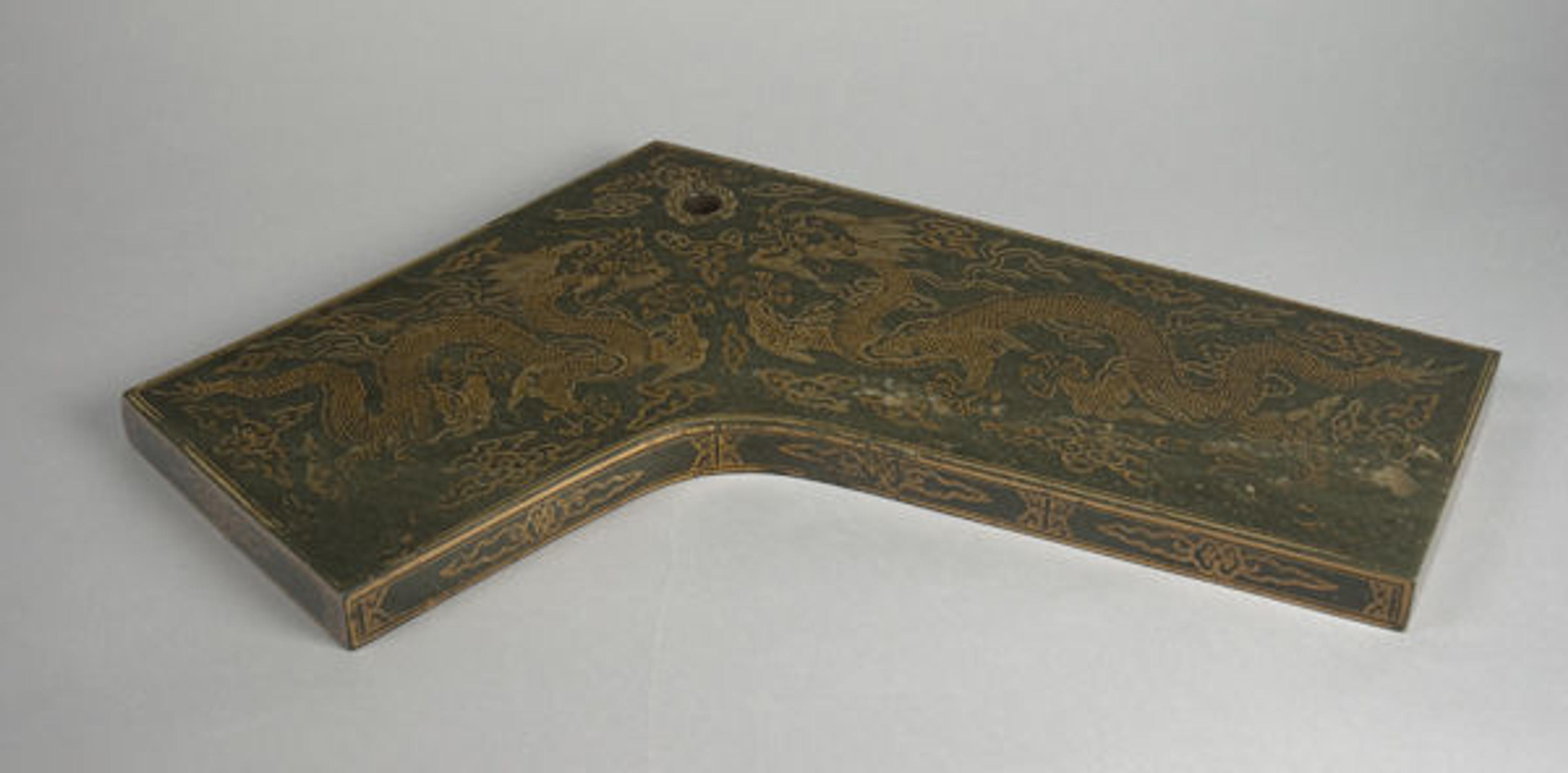 Chime (Qing) for Linzhong (8th note in the 12-note scale), dated 1716. China, Qing dynasty (1644–1911), Kangxi period (1662–1722). Jade with incised gilded design. The Metropolitan Museum of Art, New York, Gift of Major Louis Livingston Seaman, 1903 (03.15.1)