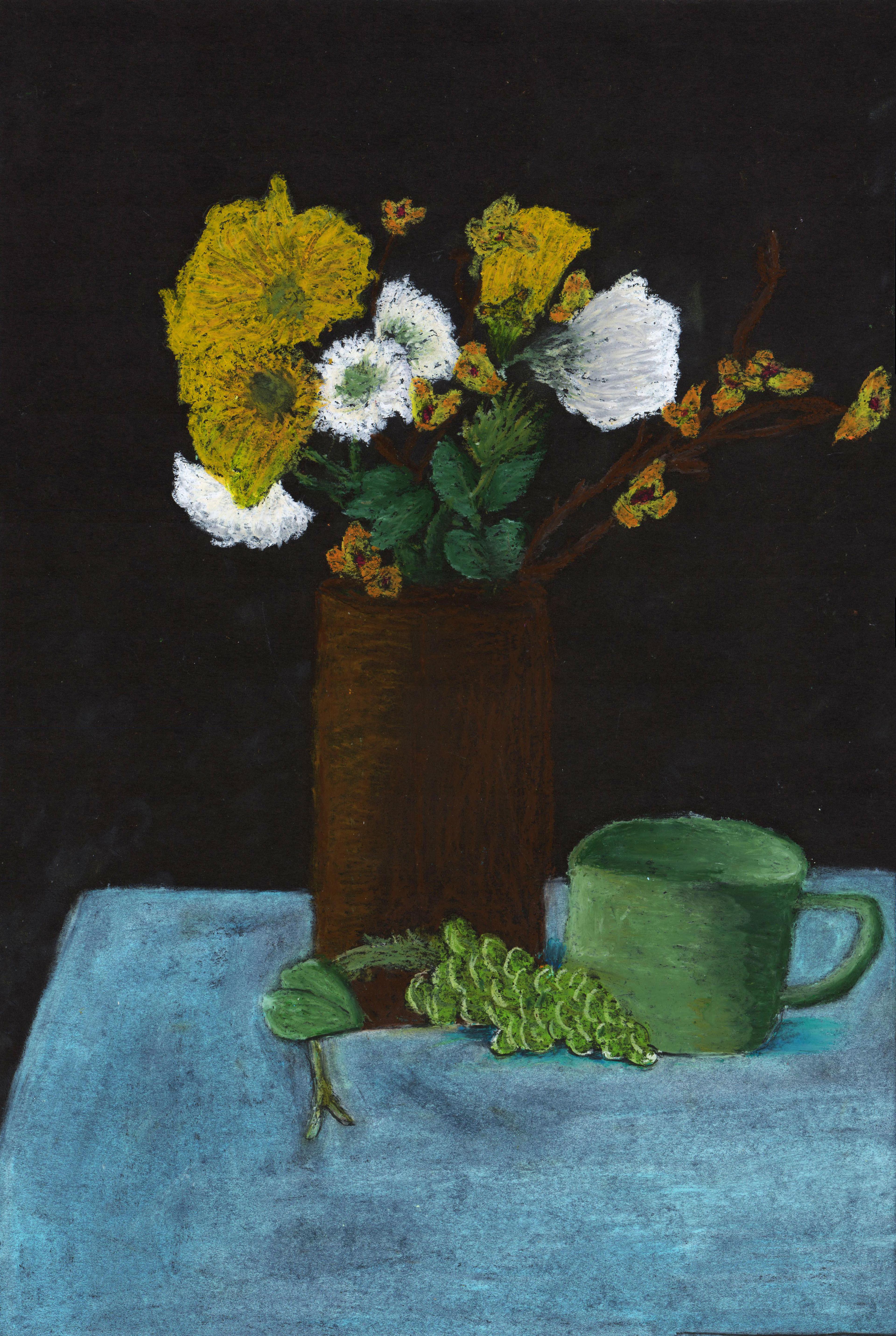 Oil-on–pastel paper painting of a tall brown vase on a blue tablecloth containing numerous white and yellow flowers with green leaves. A bunch of green grapes sits in front of the vase, with a green mug sitting slightly to the right. The dark background is nearly black.