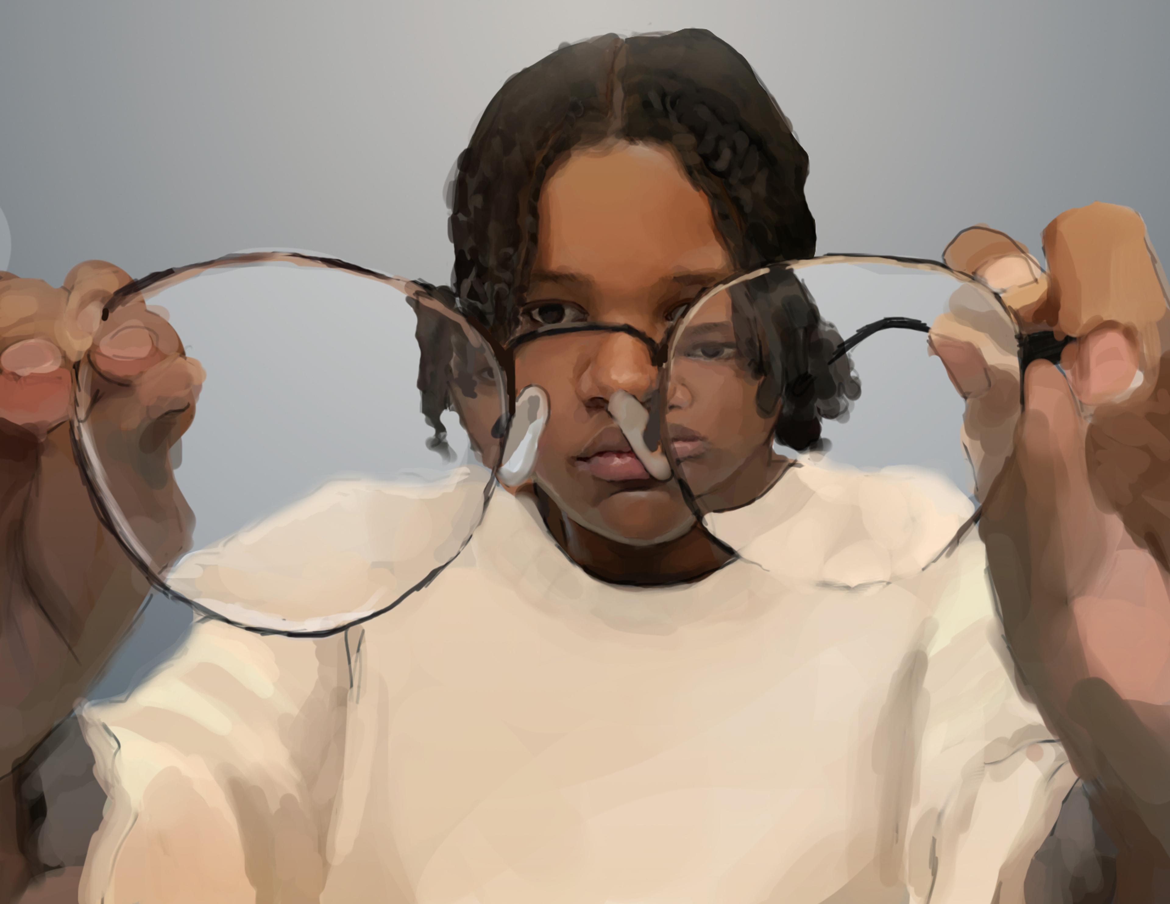 Self portrait through the looking eyes of glasses.
