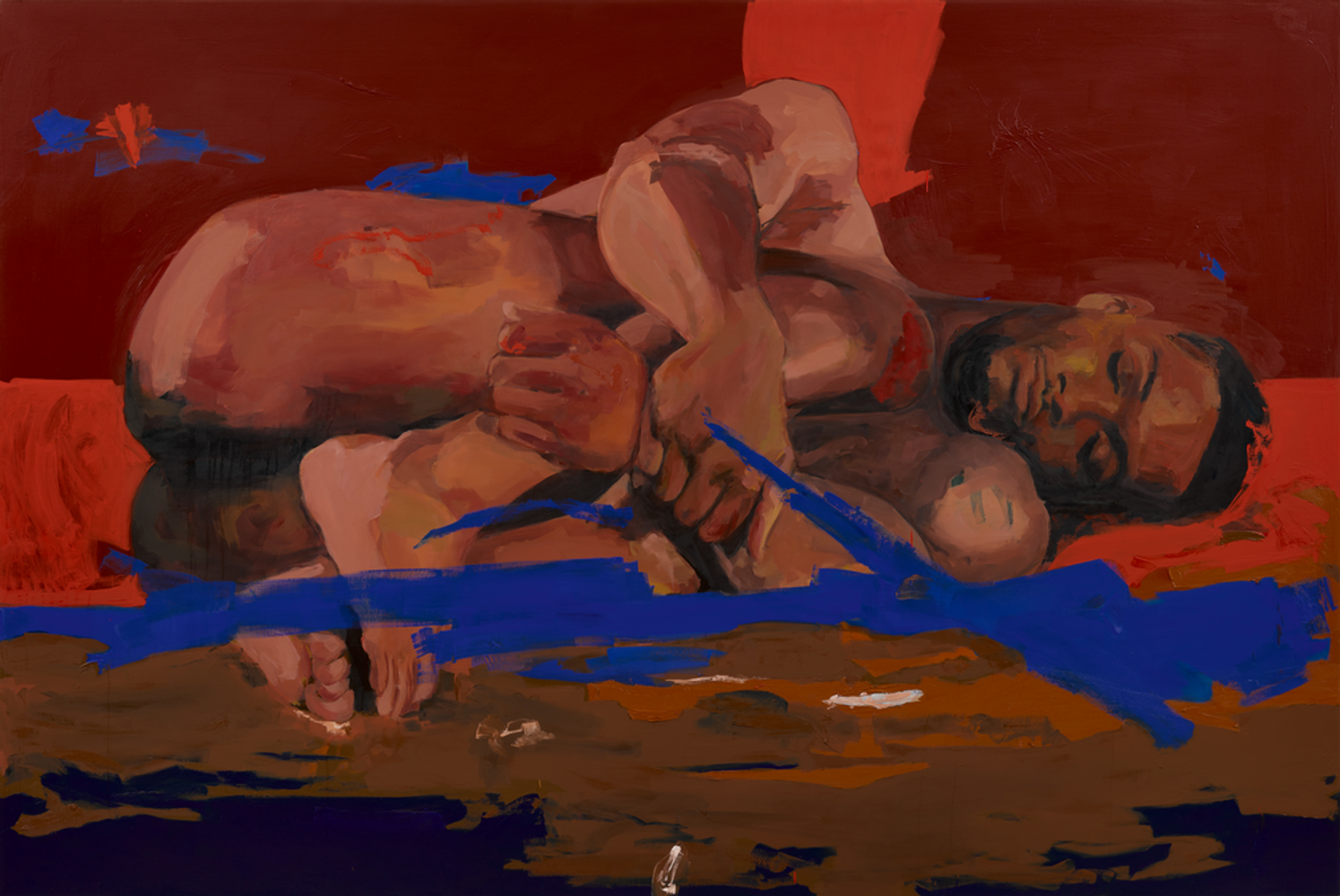 Resting man on red earth