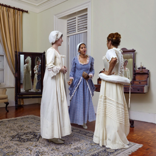 Act I, Scene XIV: In which Polly, with the Help of Damaris, Convinces Mrs. Ducat to Punish Her Husband by Granting Her Her Freedom