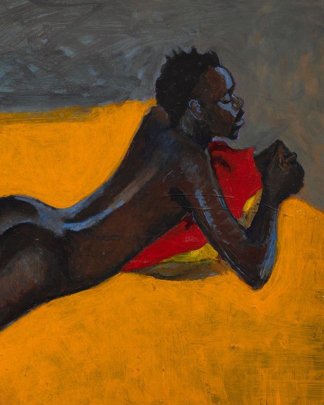 Male nude on yellow blanket