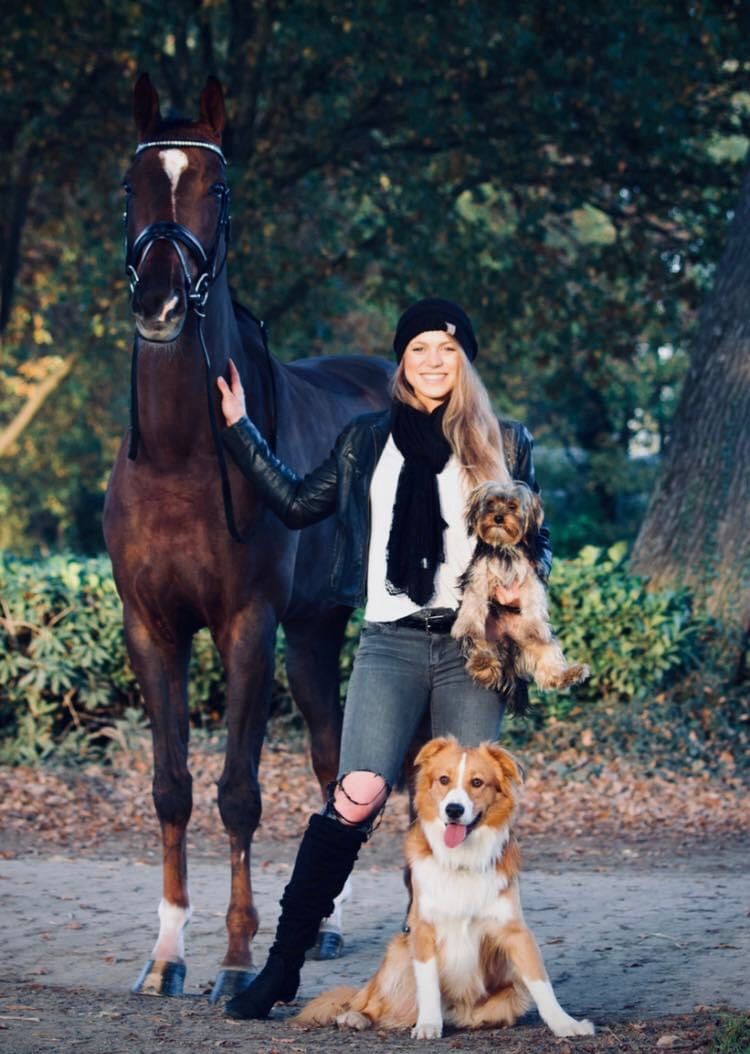 equestrian brandi roenick with horse Quantastica and dogs Teddy and Buddy.
