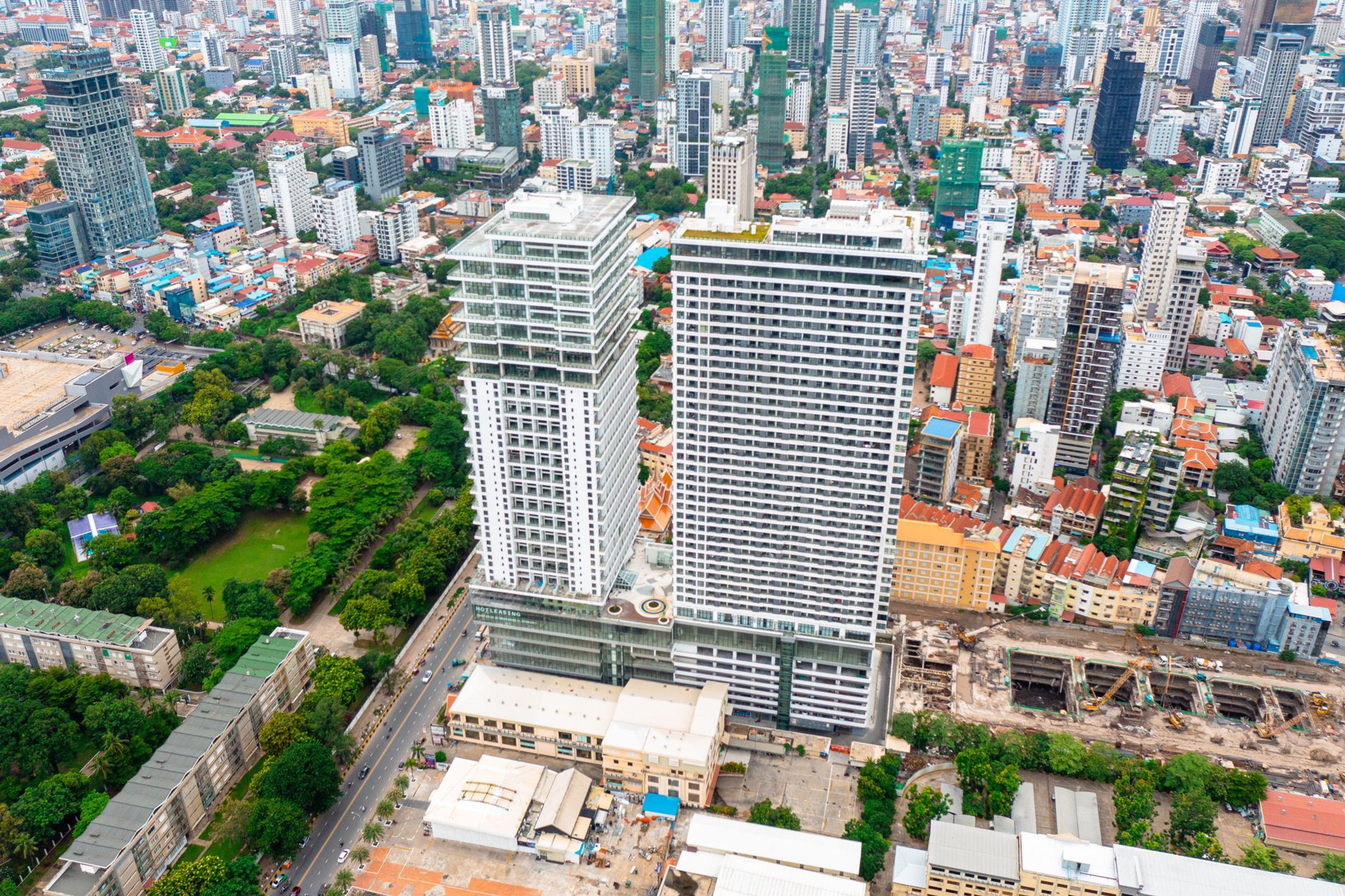 Two newly built condominium towers rising above central Phnom Penh's skyline