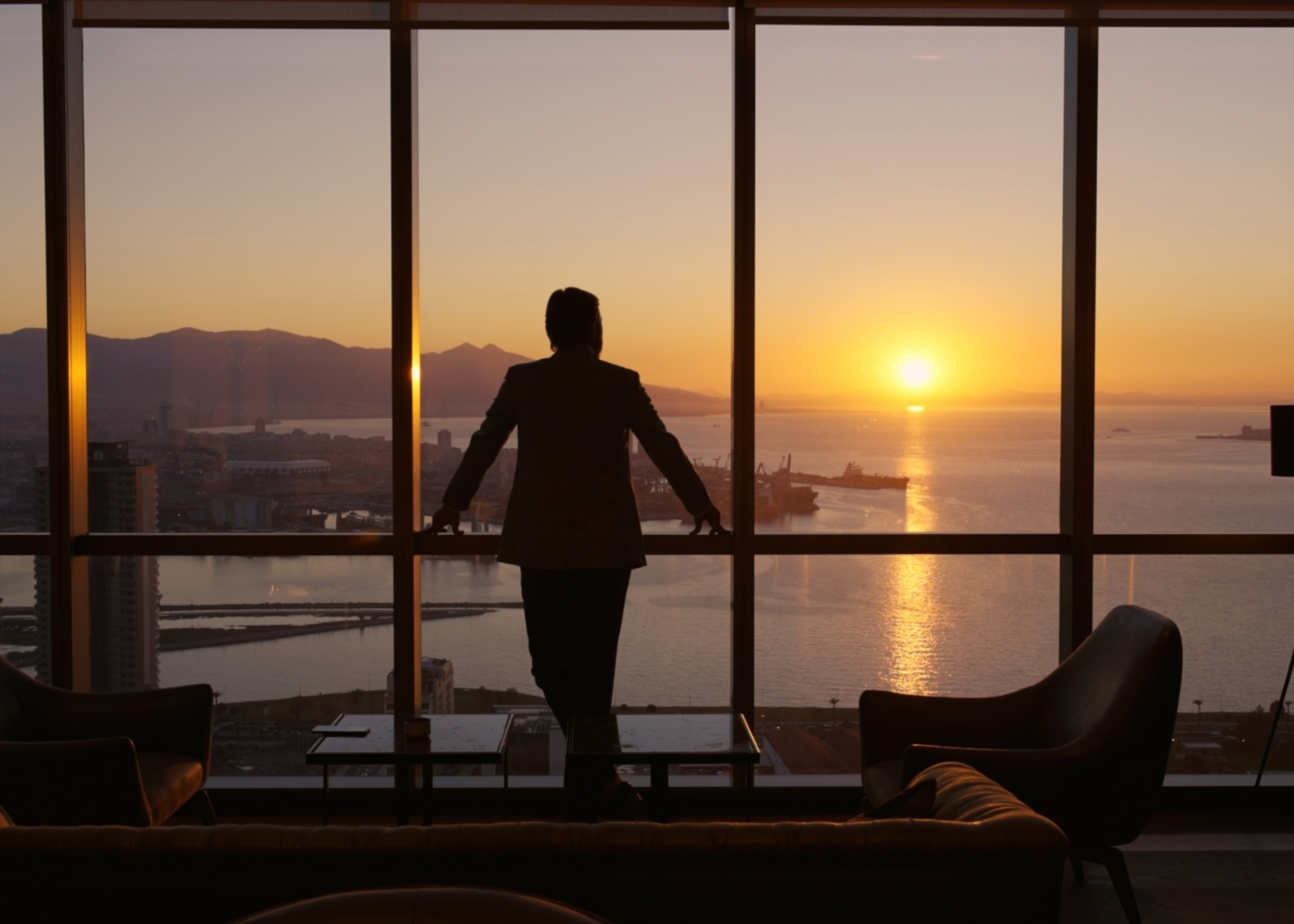 Business owner looking out of the window