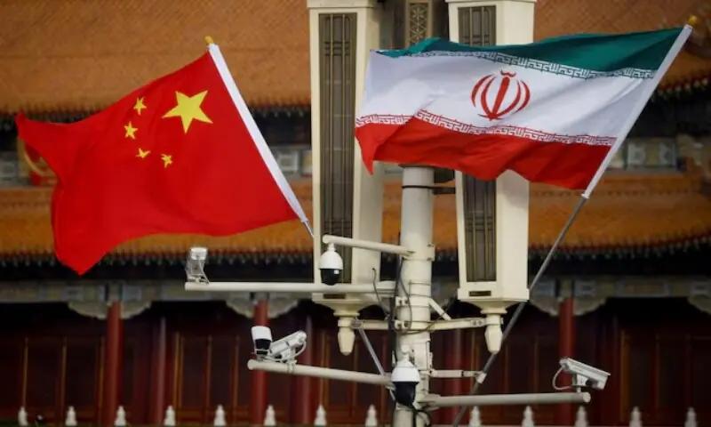 The national flags of China and Iran are displayed in Tiananmen Square, Beijing, on February 14, 2023. — Reuters/File