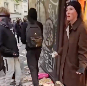 Woman Begs Vandals to Stop Destroying Store 