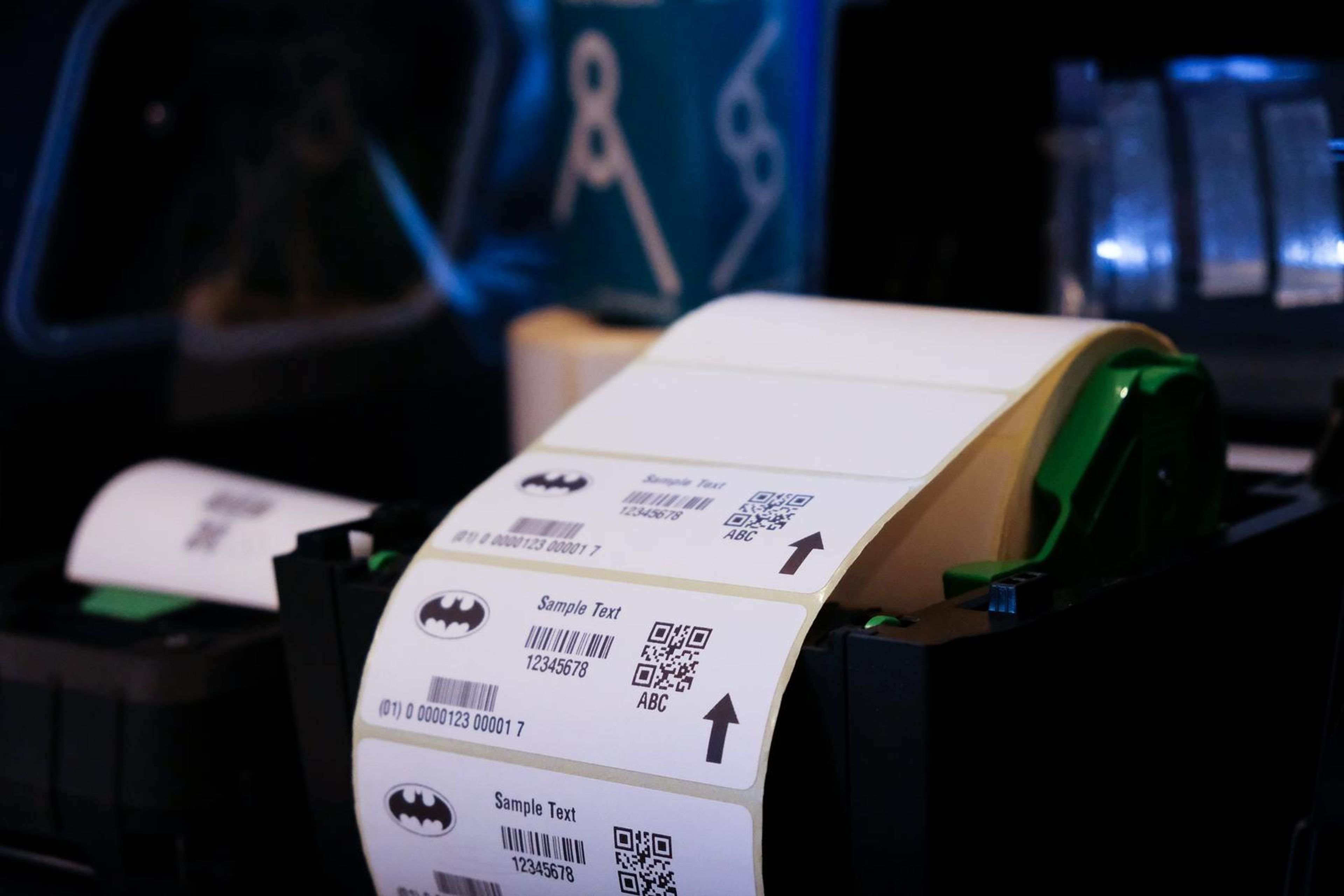 Label printer producing a barcode label at the PDC stand