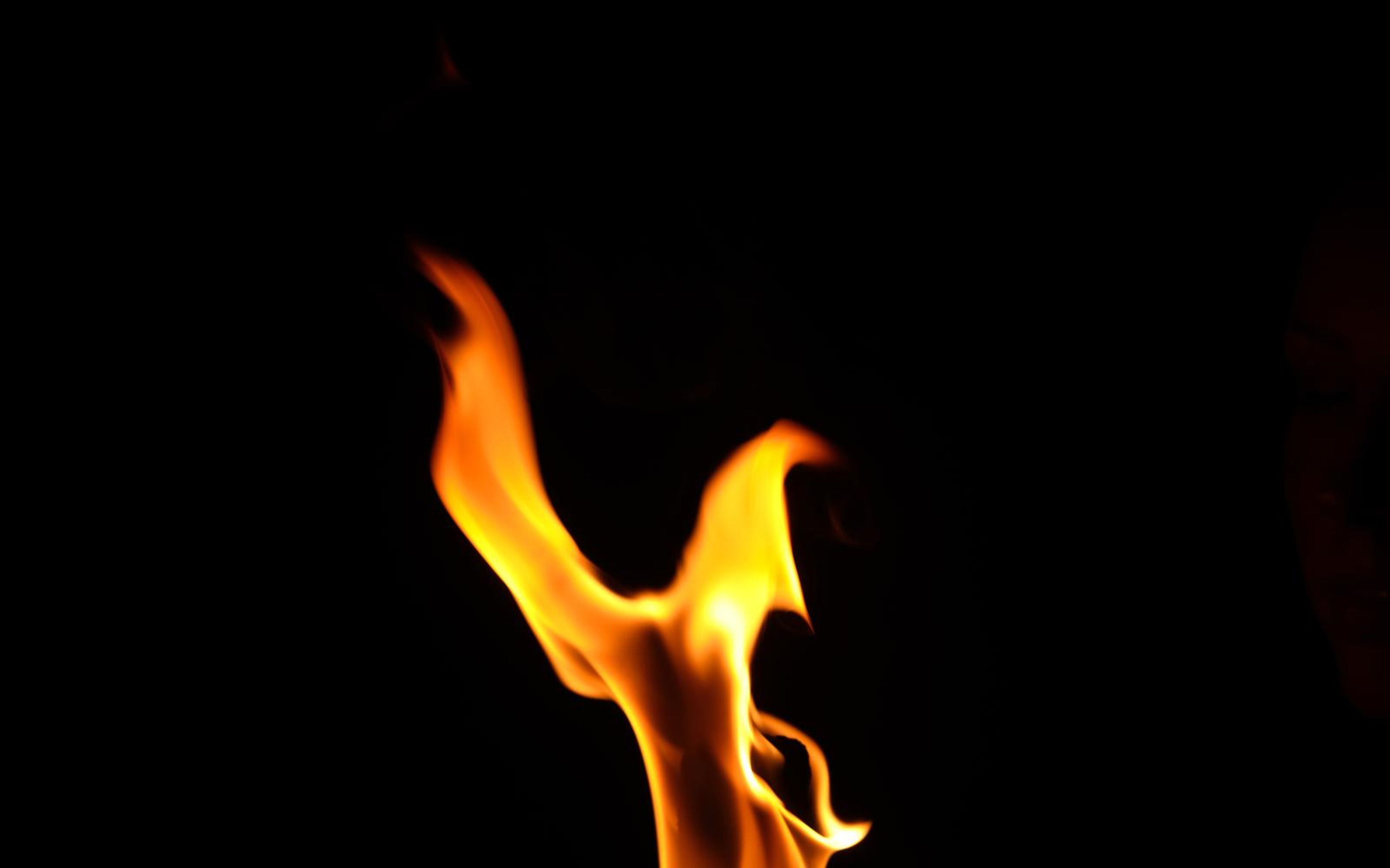 Flame rising from the bottom edge with a curved hook at the top