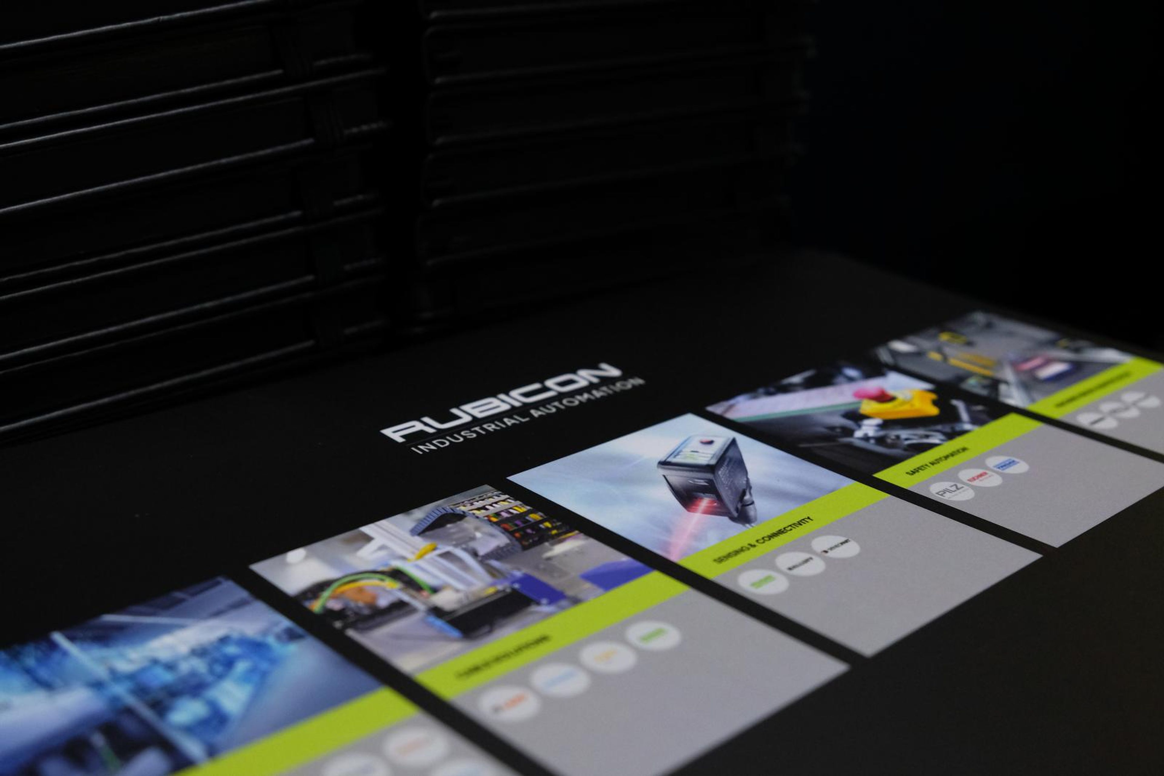Rubicon product cards laid out on a black display