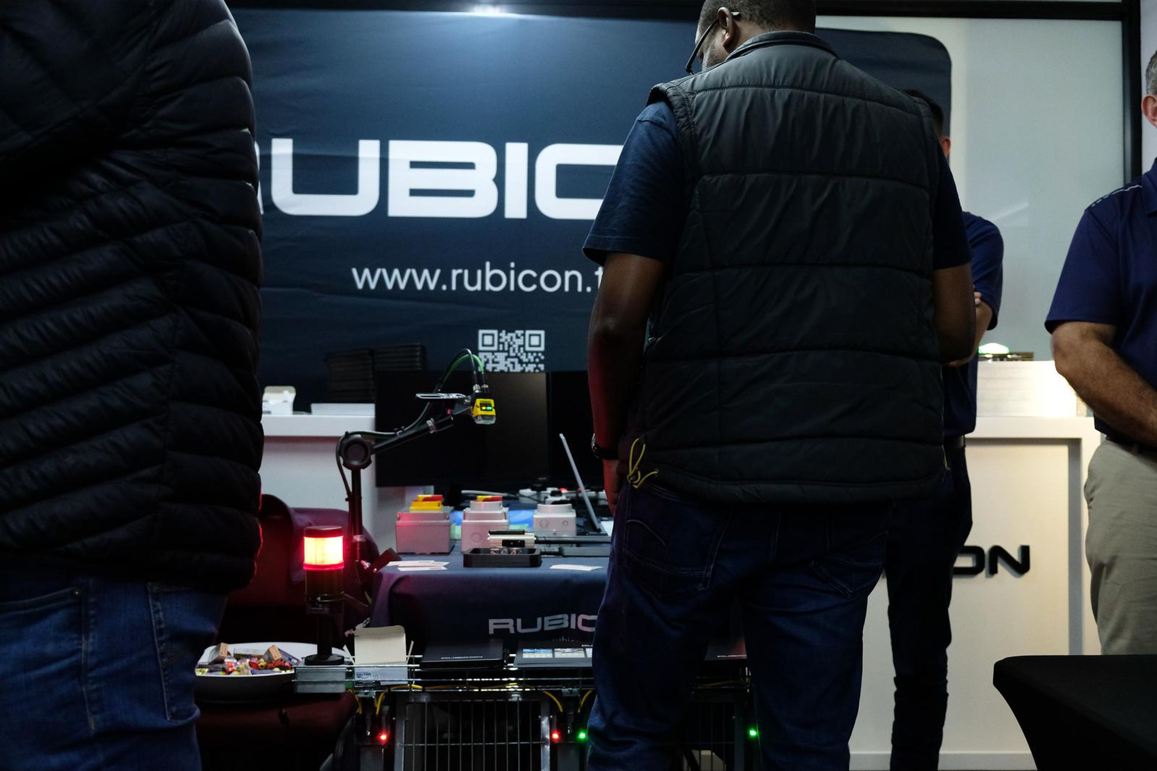 Rubicon stand with visitors and a demonstration robot