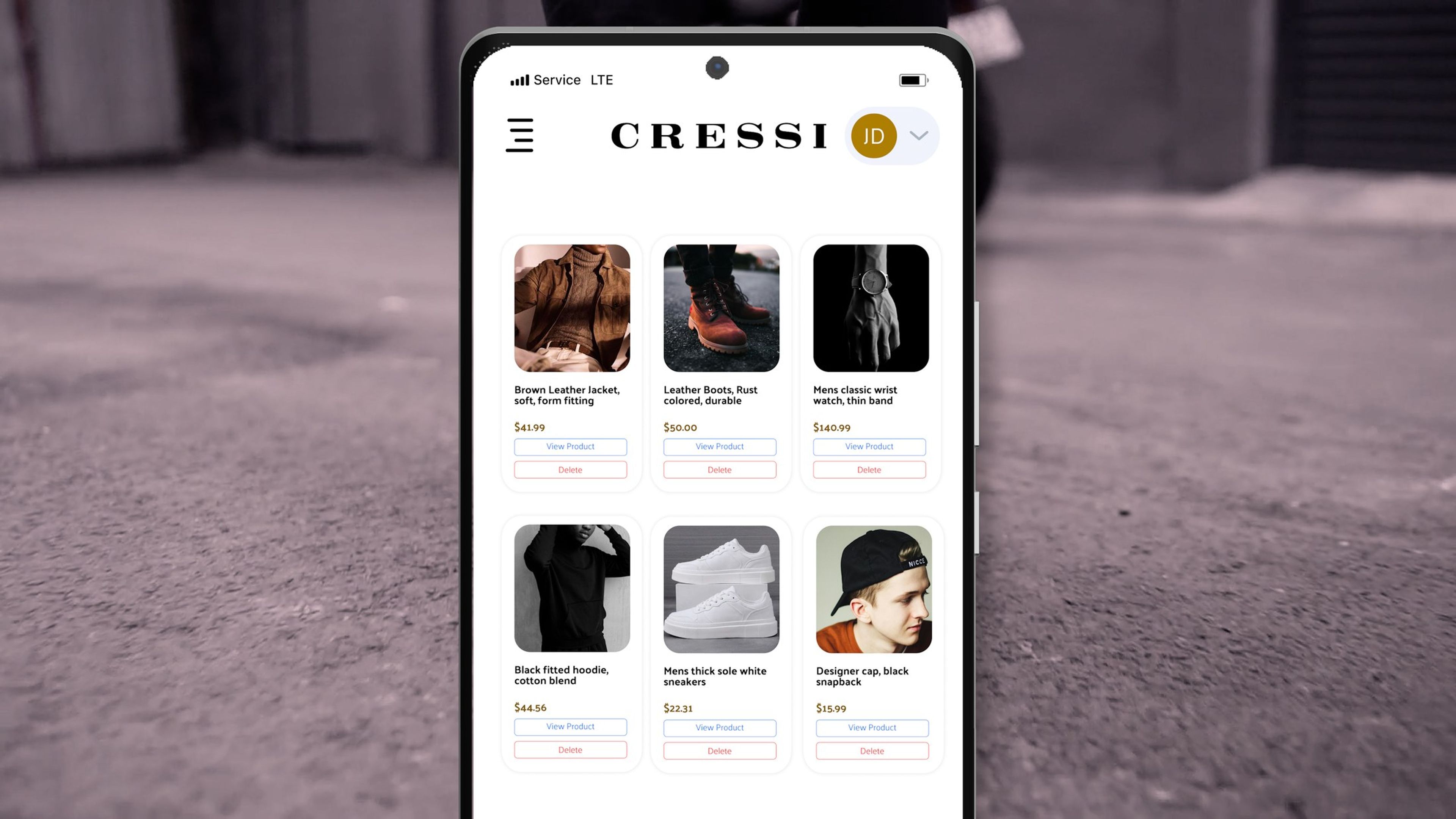 CRESSI app product grid shown on a phone against a pavement background
