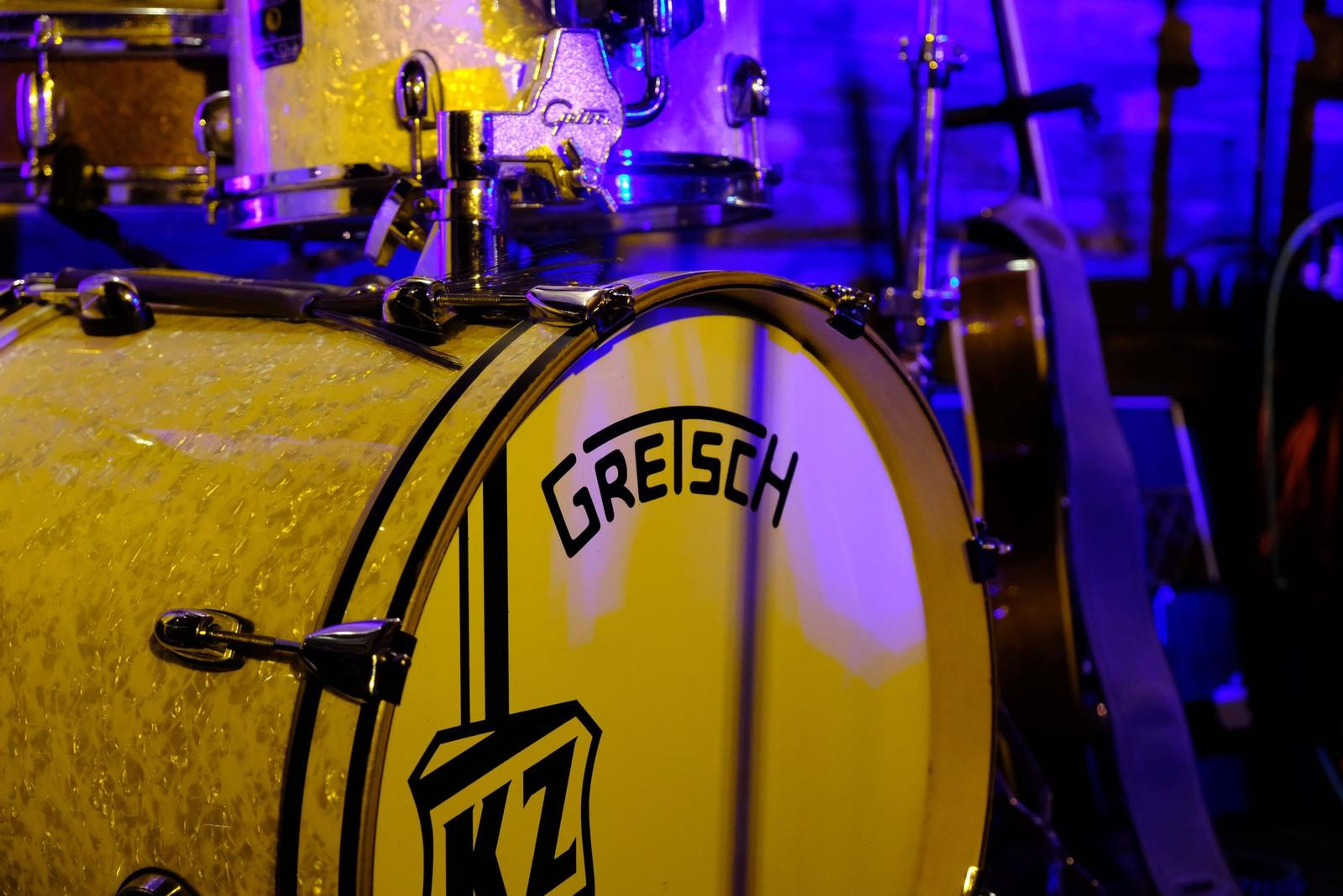Gretsch bass drum with the Misfits letters under yellow light