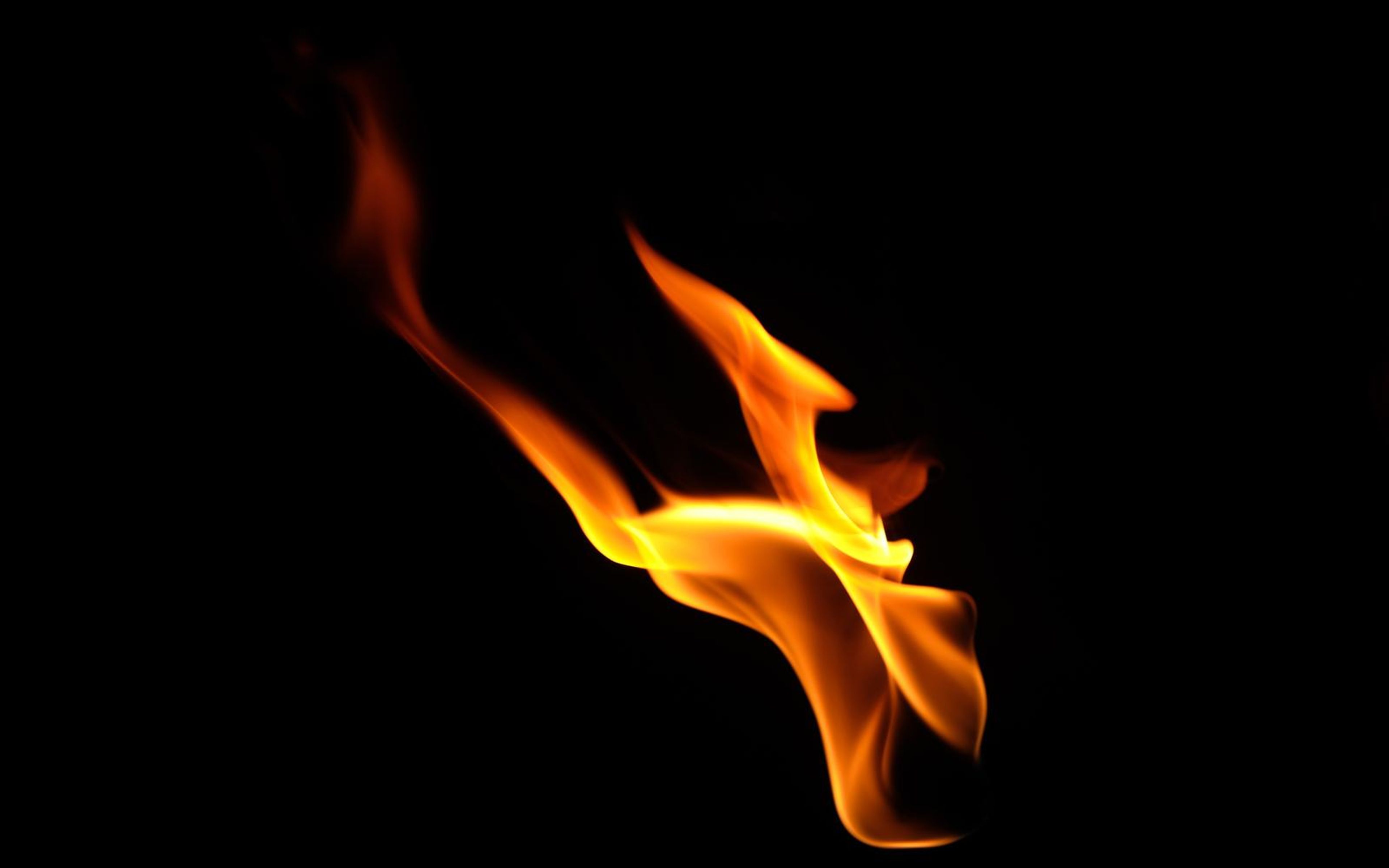 Long thin wisp rising diagonally to the upper left from a low flame