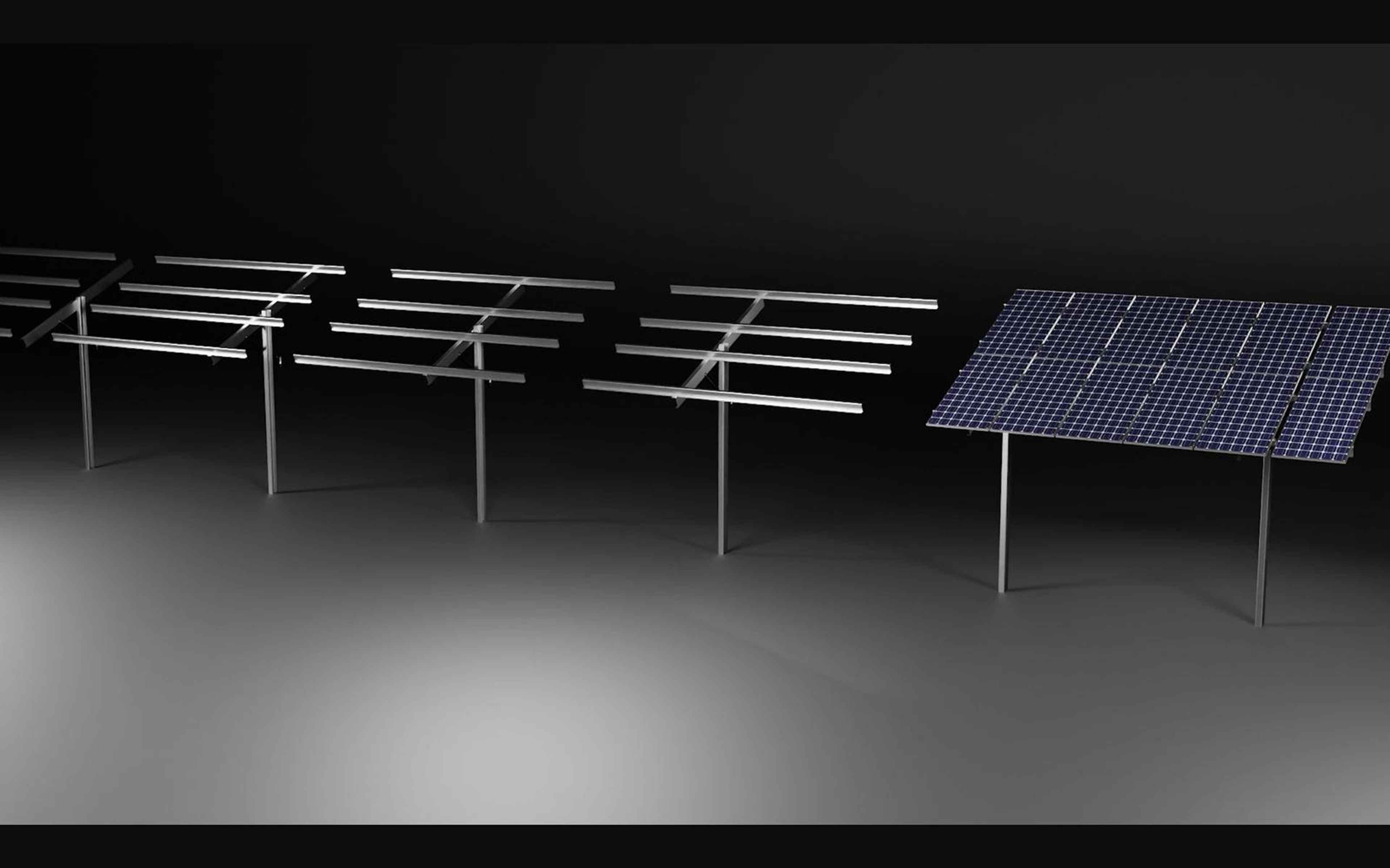 Row of mounting frames with a solar panel being placed on the last one