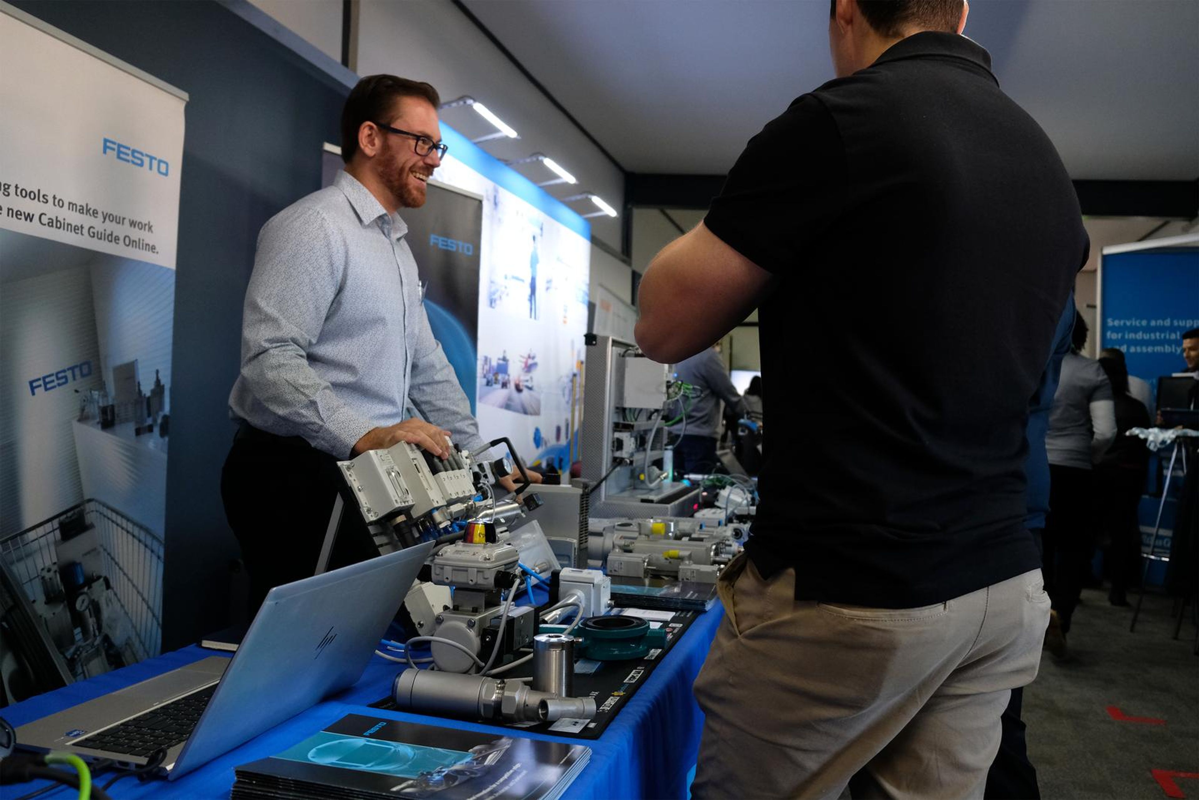 Festo presenter at his demonstration table