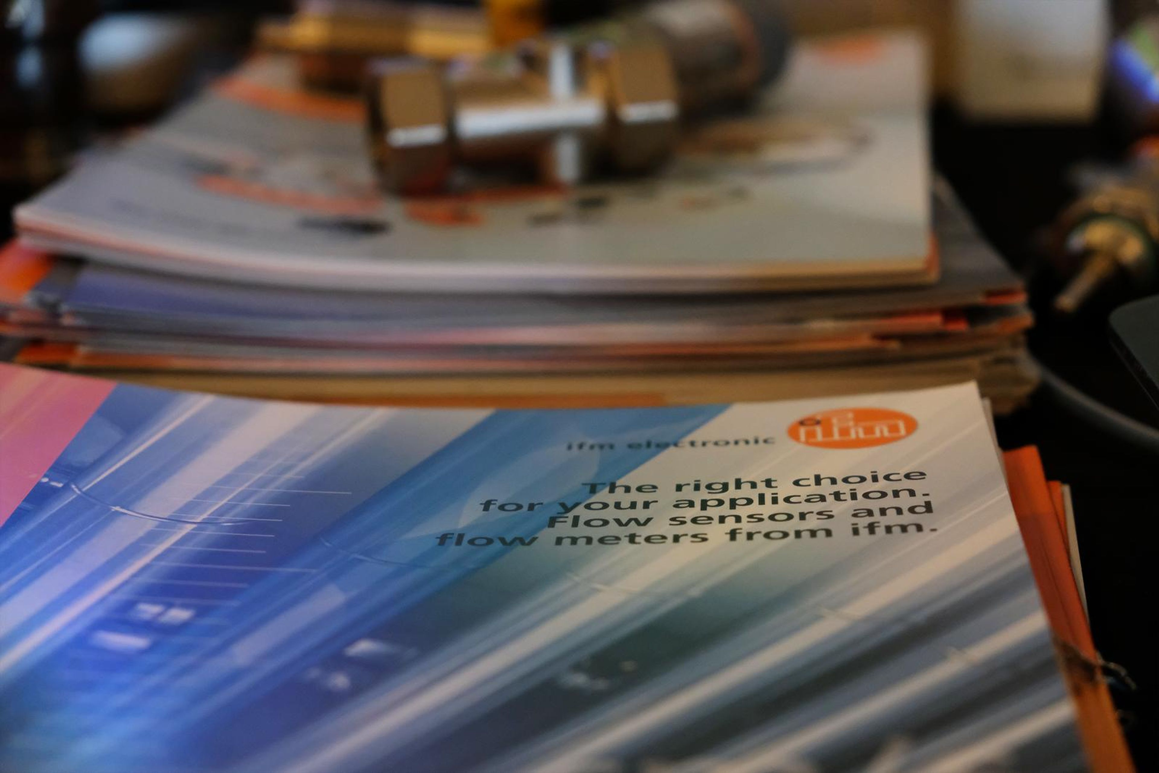 IFM brochures on the stand table