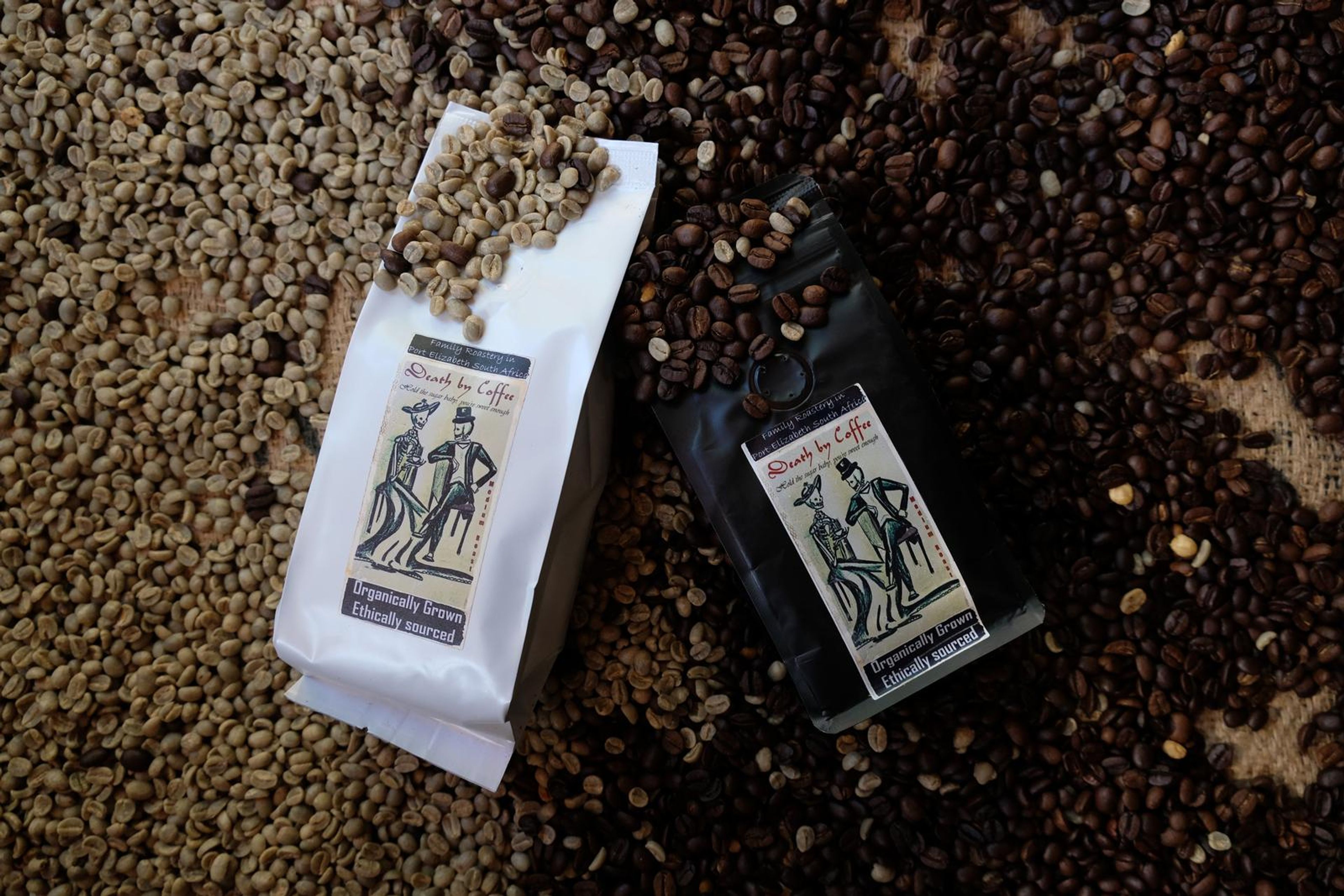 Death By Coffee creative product photography of coffee, beans and branded bags