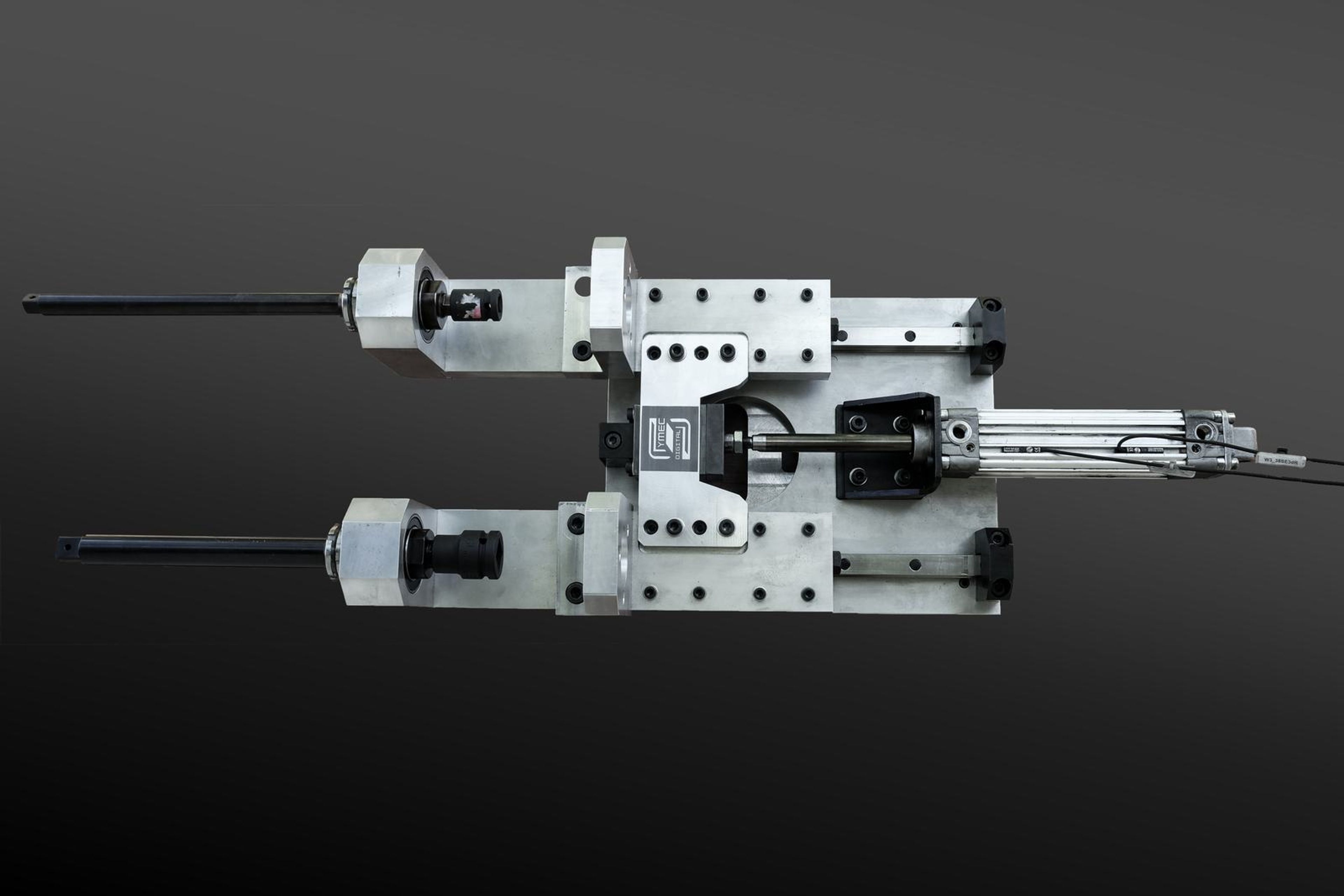 Wide view of the whole bolting tool on a dark gradient background