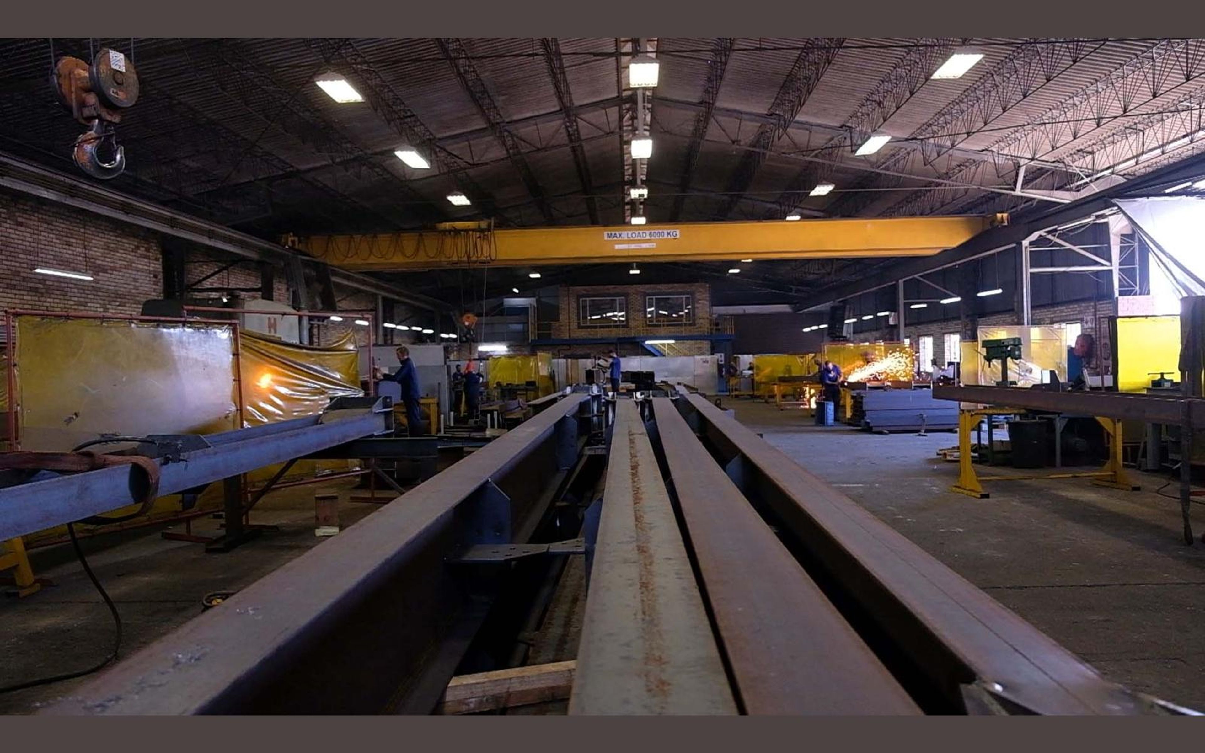 Overhead crane over steel frames in the fabrication bay